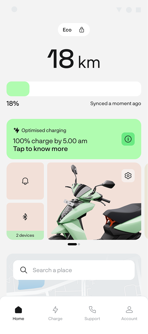 The Ather home screen while charging: 18 km range, an 18% charge bar and a card saying optimized charging, 100% charge by 5.00 am