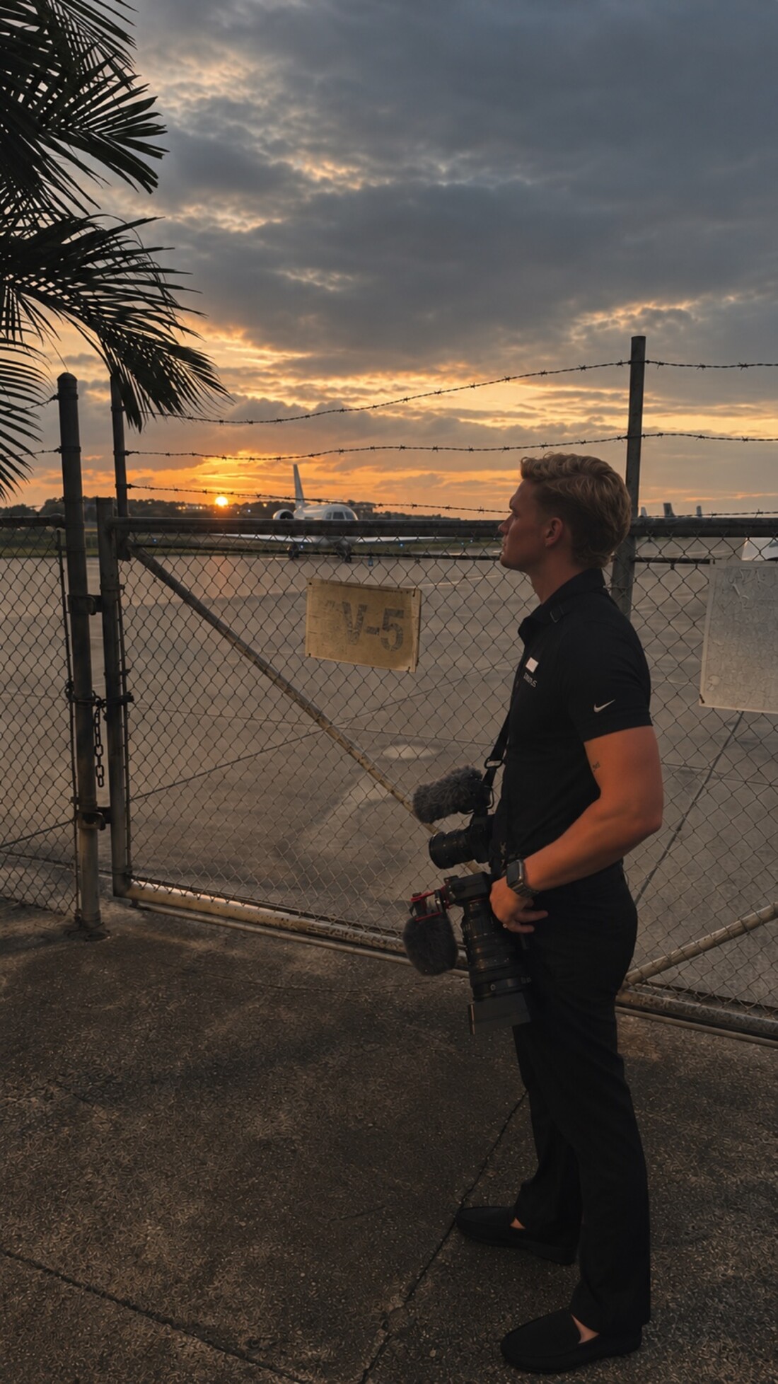 Matthew with his camera at sunset