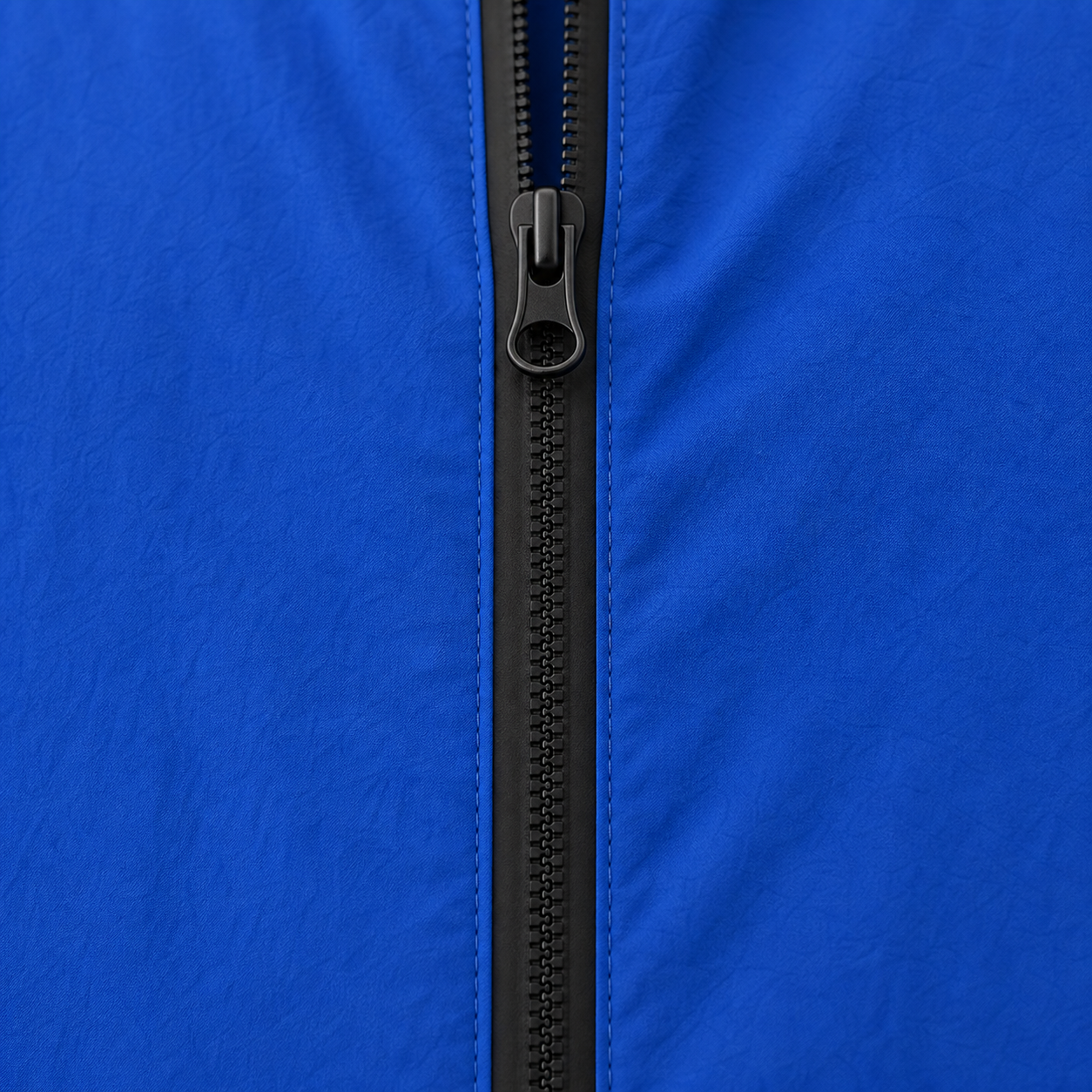 SEAMFORM SF-01 close study — the centre two-way zip and matte black hardware.