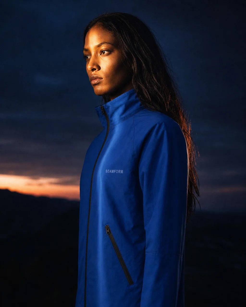 A model in profile against the last of the light in the SEAMFORM SF-01.