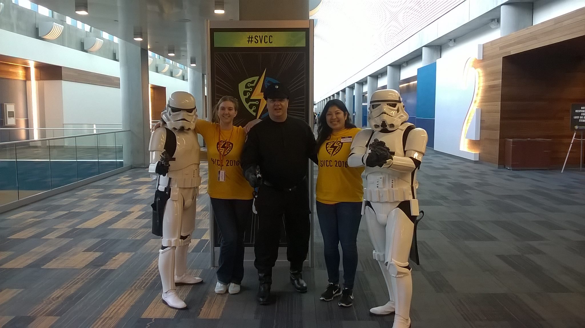 picture of two silicon valley comic con 2016 staff members with 3 guests cosplaying as star wars characters