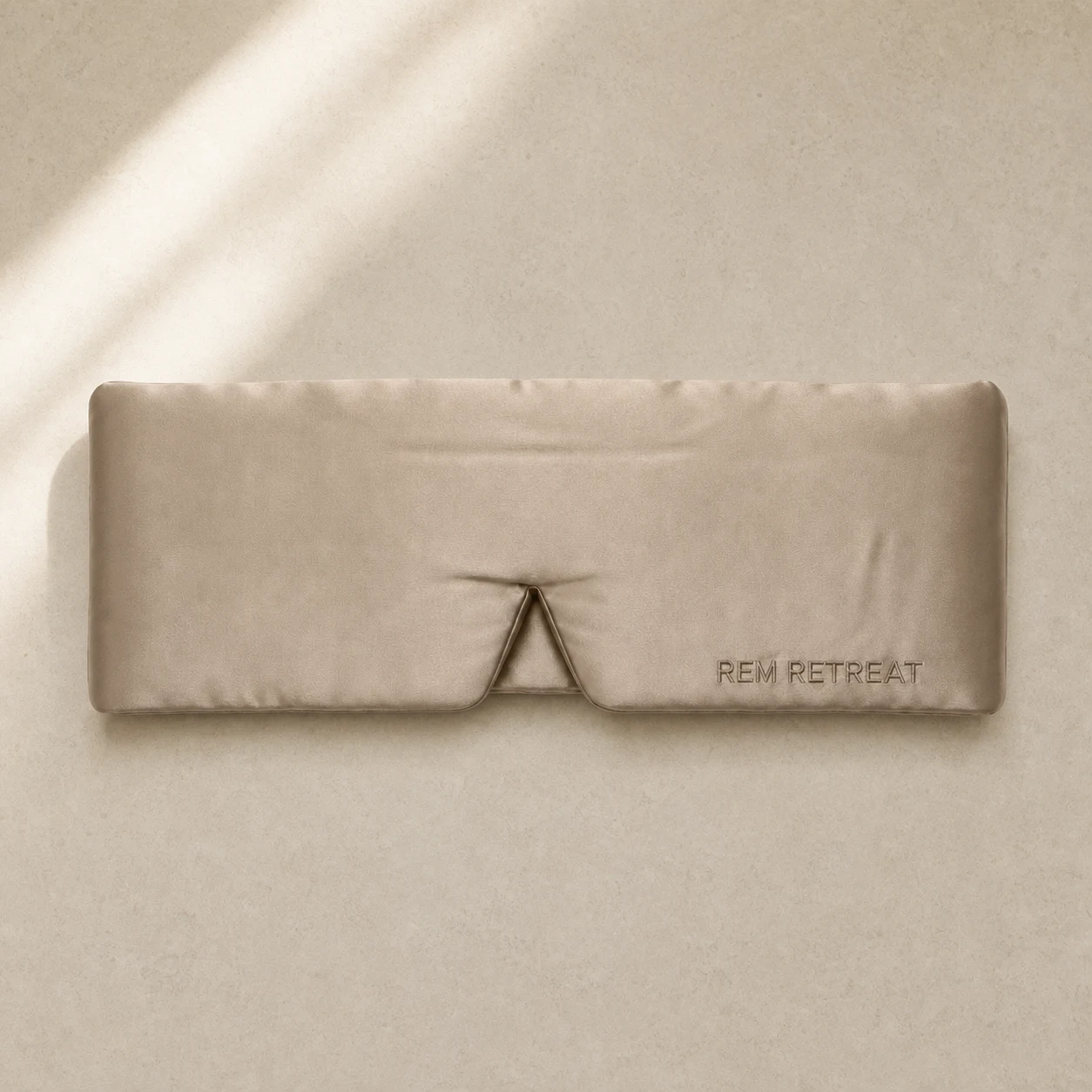 The REM Retreat Champagne silk sleep mask product page image