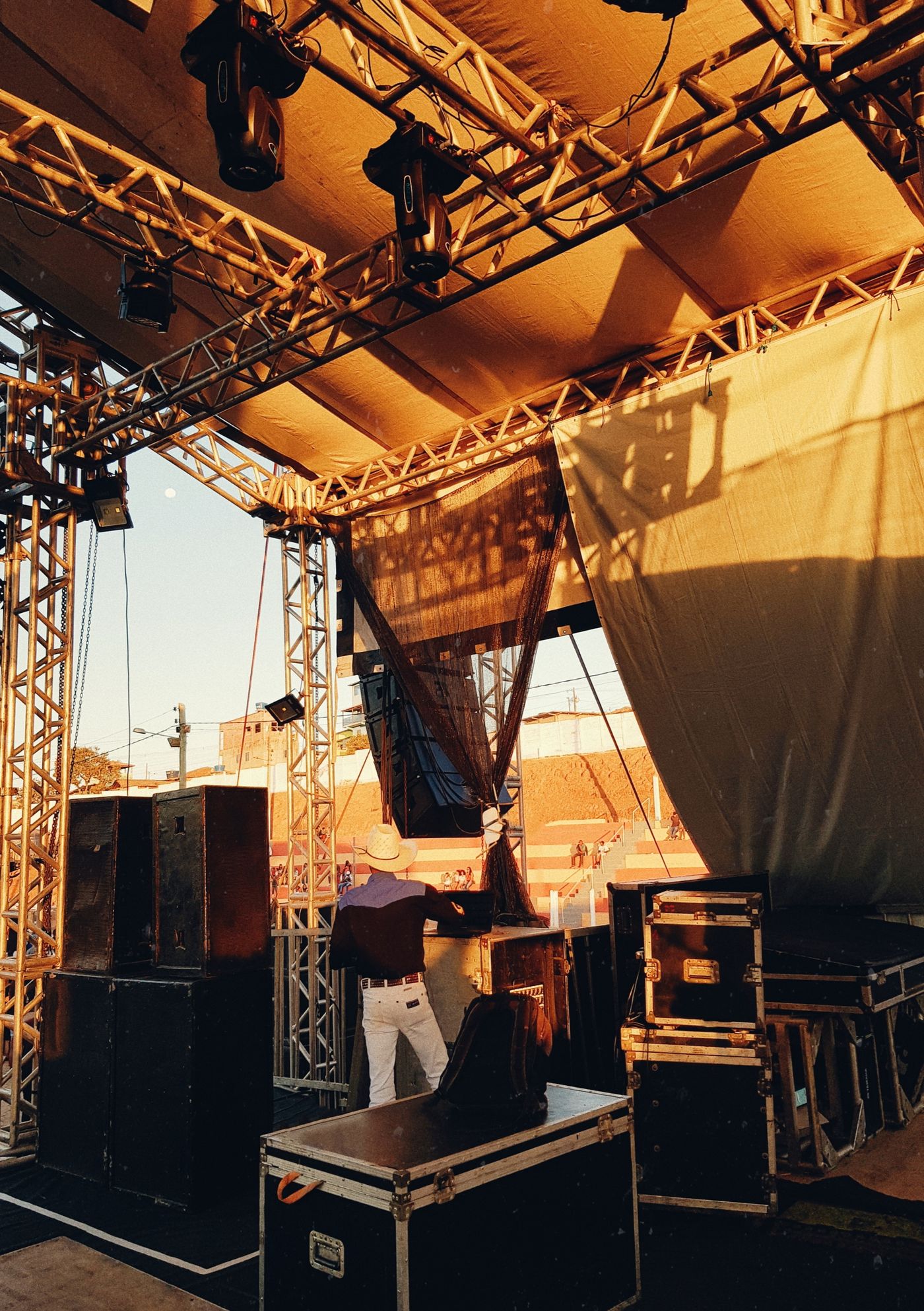Backstage flight cases, speakers, trussing and drapes