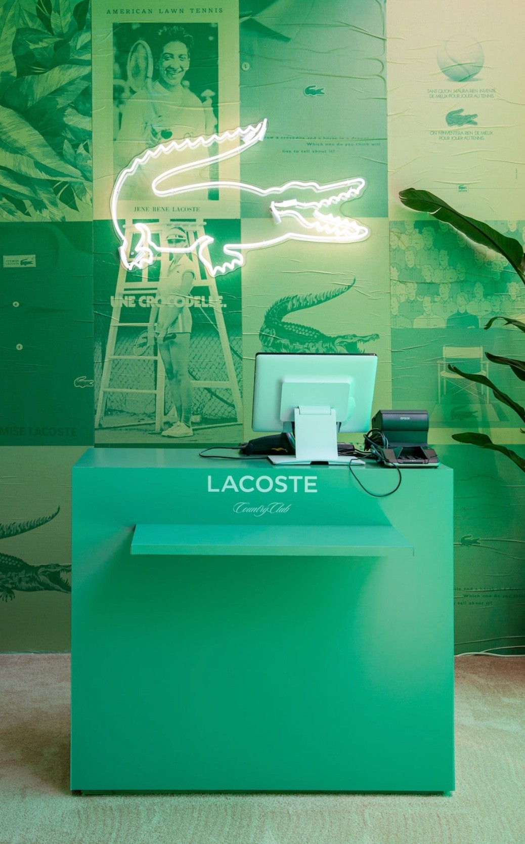 Stacked square glass jars filled with golden serum and bubbles, silver lids—luxury skincare packaging on a light background.