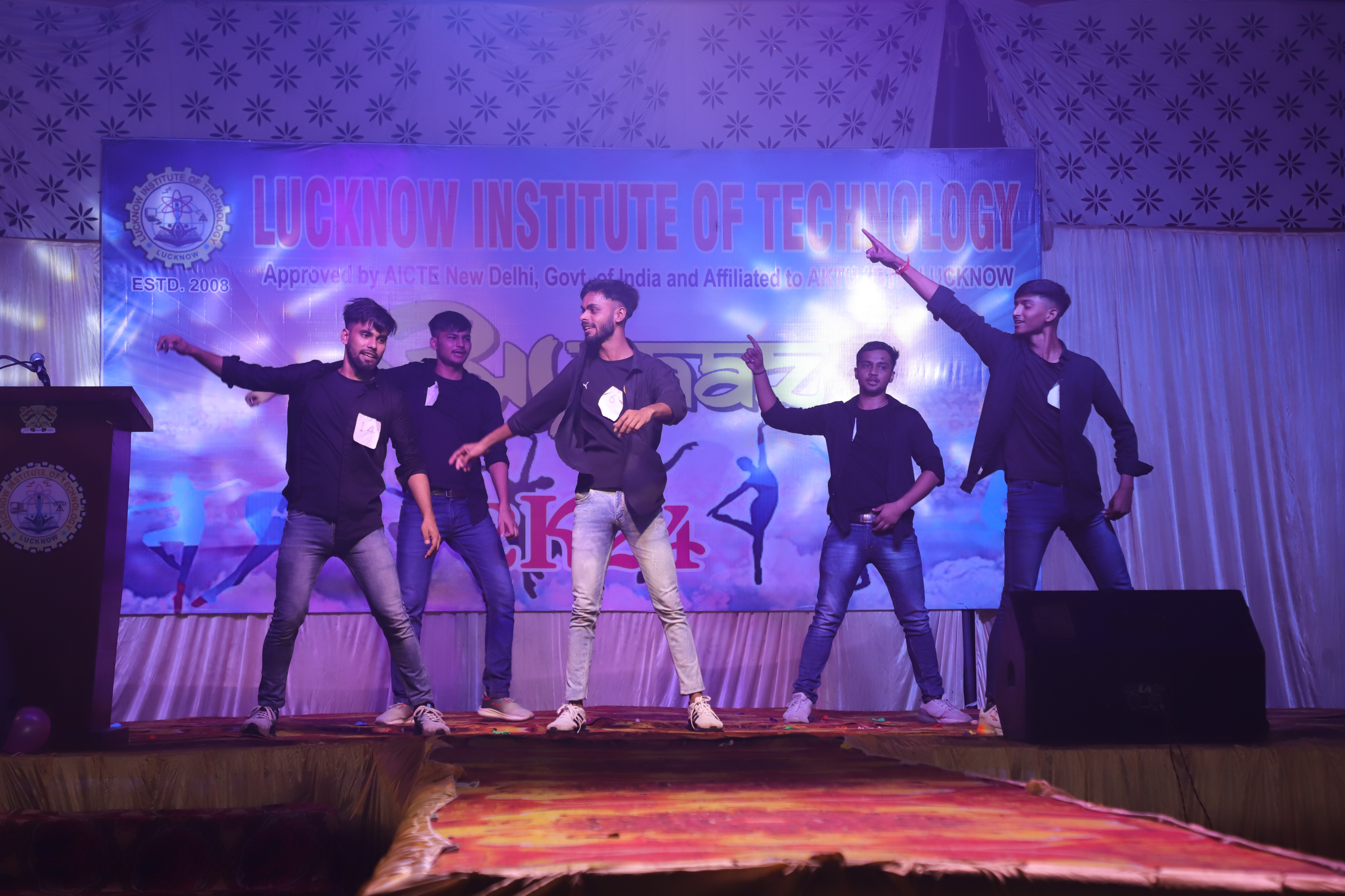 people sitting on chair in front of table while holding pens during daytime