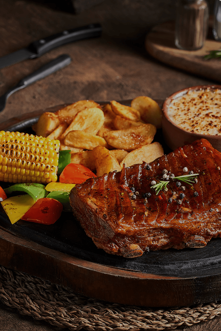Ornate dragon-adorned rooftops of a traditional asian temple.