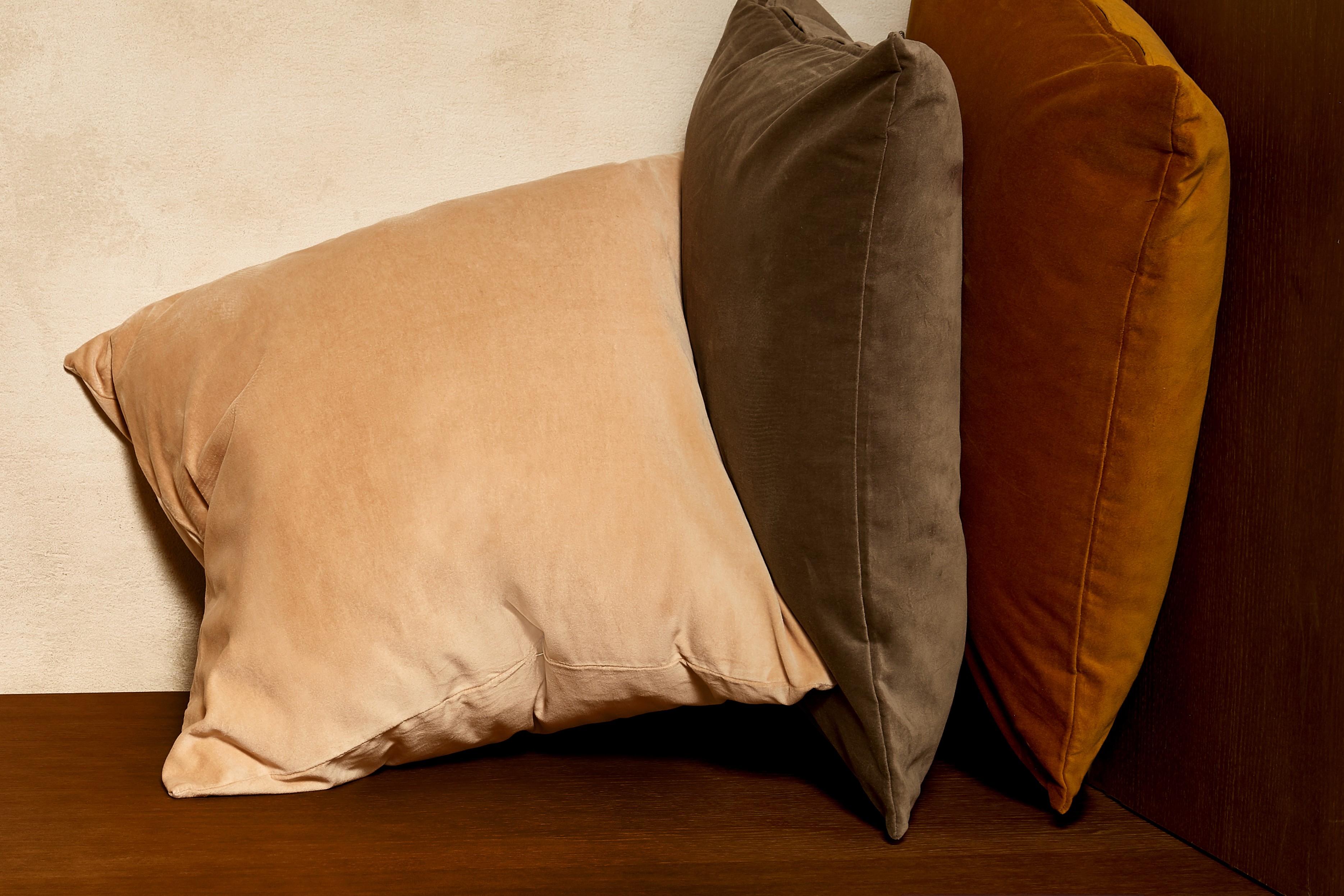 kussens warme kleuren 