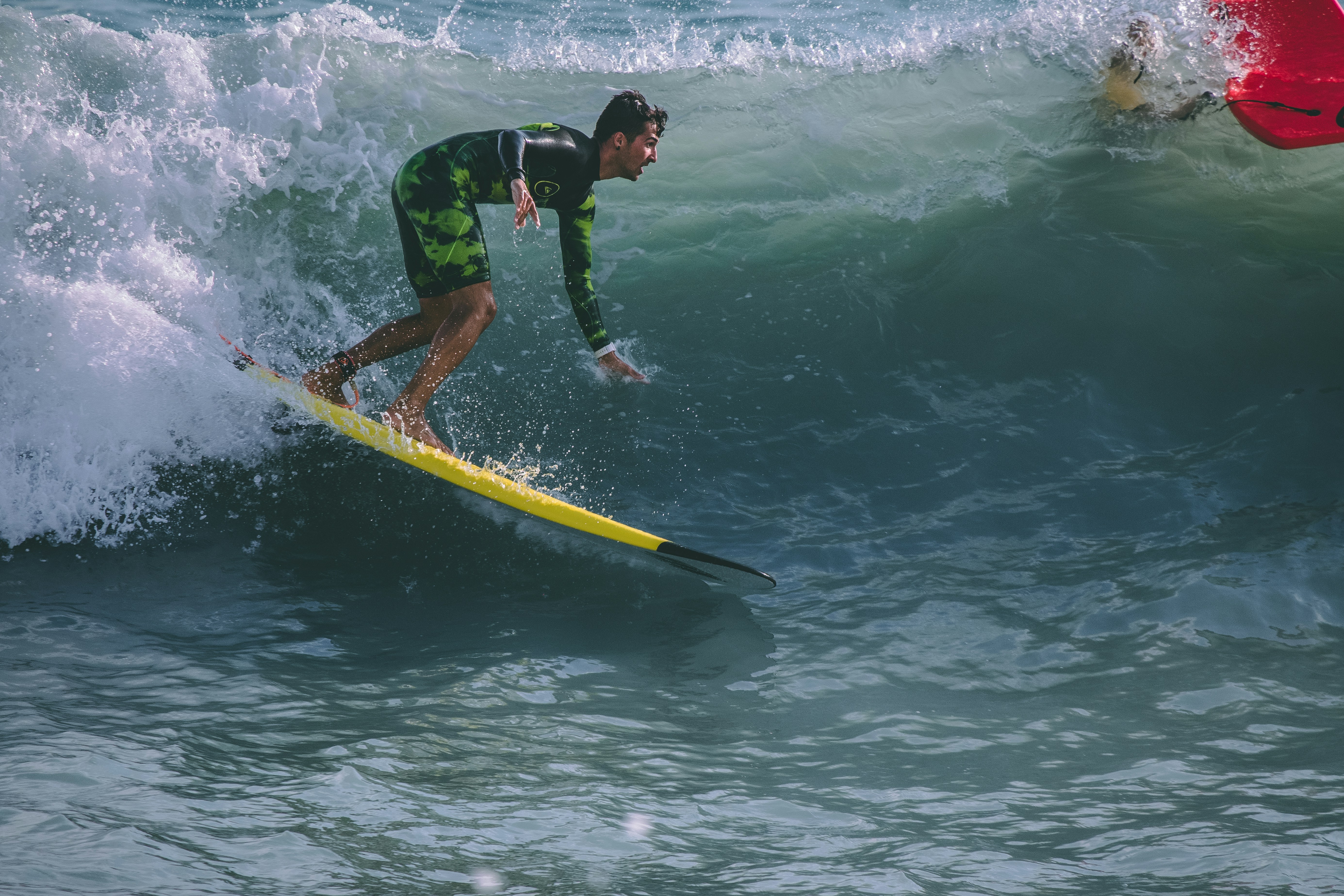 man surfing during daytime