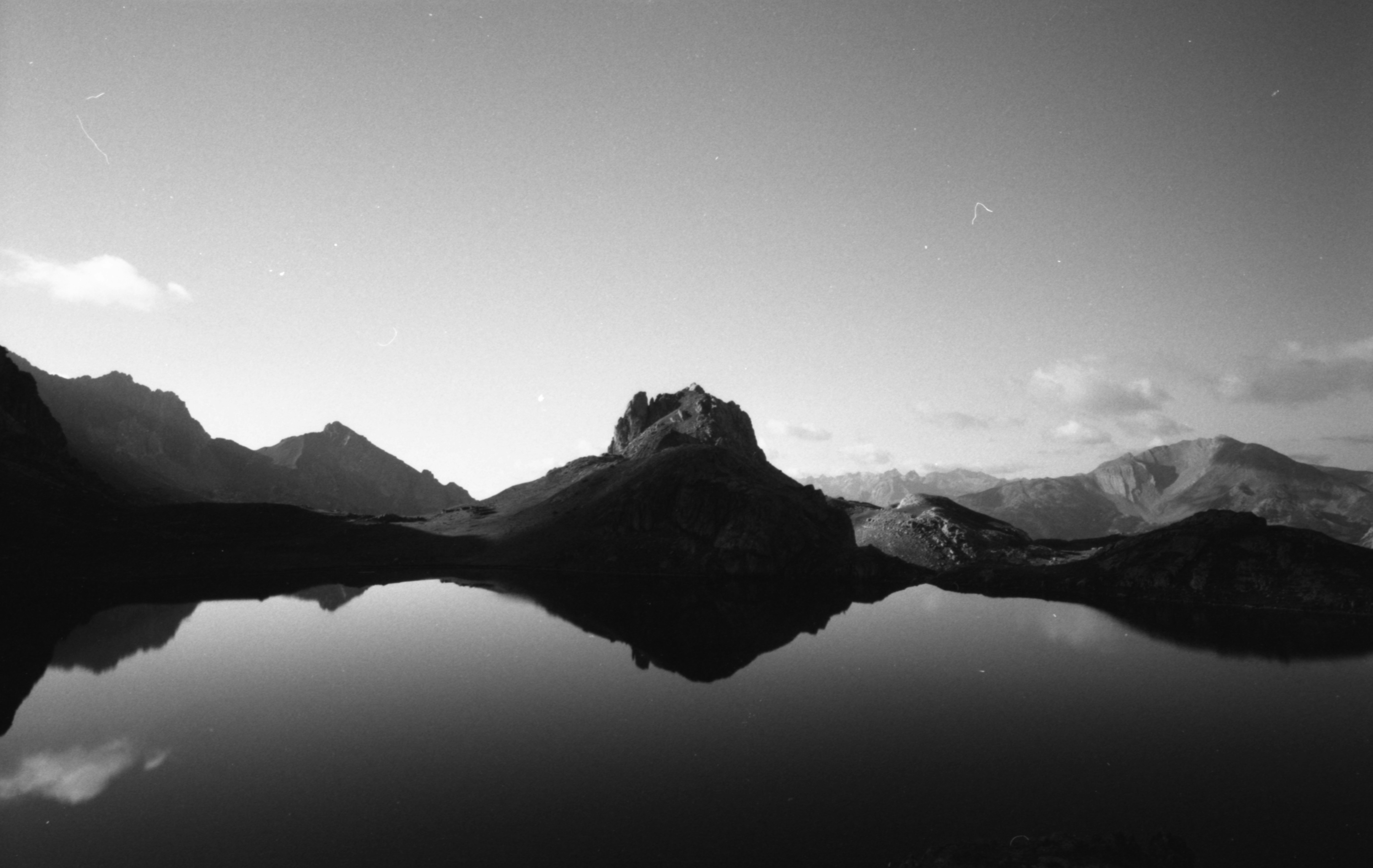Mountain lake reflection at sunrise