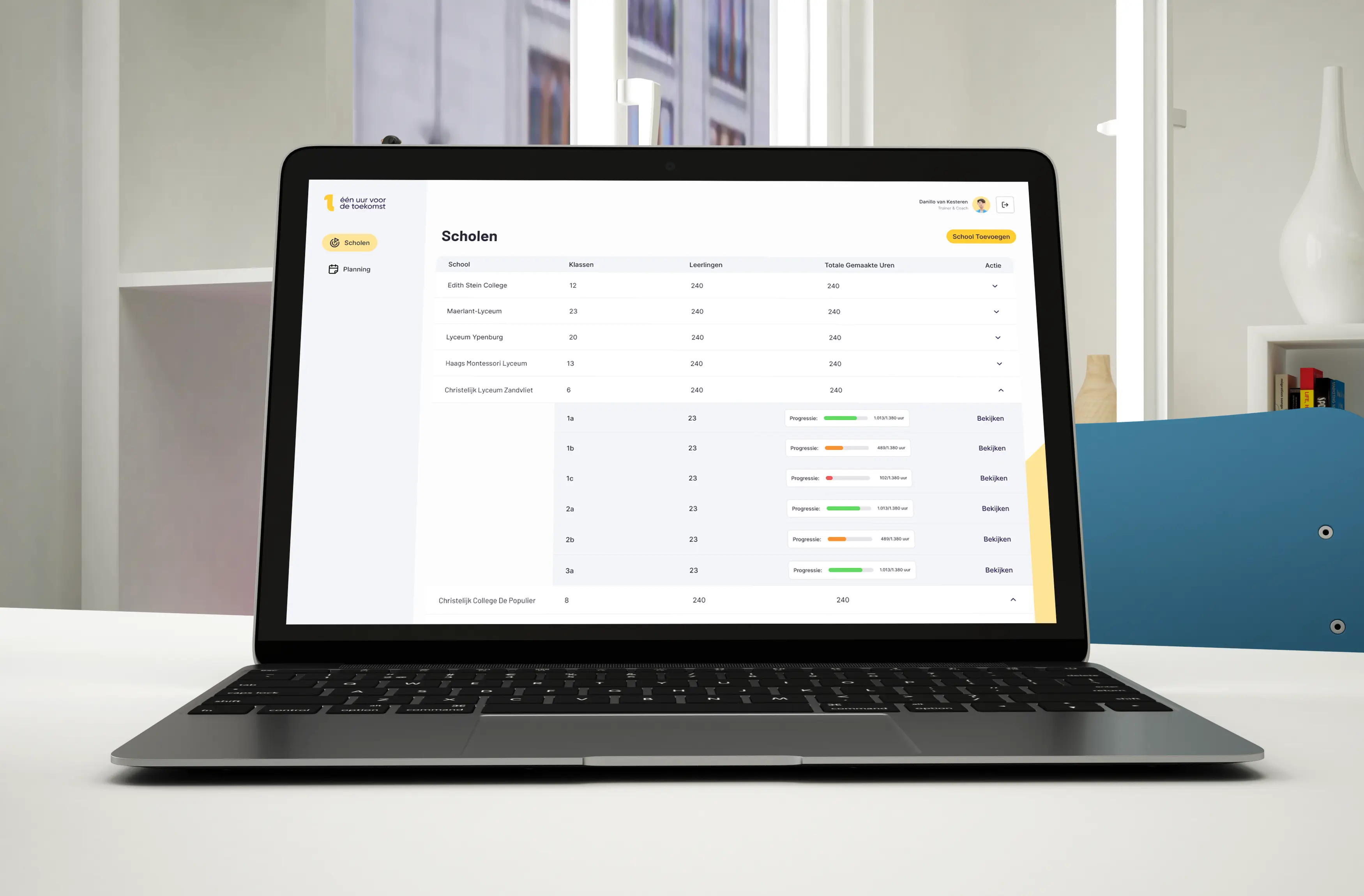 Modern bedroom with a unique brown bed and chair.