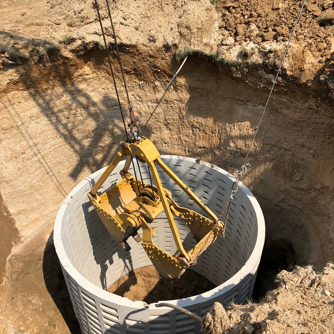 New cesspool installation with precast concrete ring in Nassau County