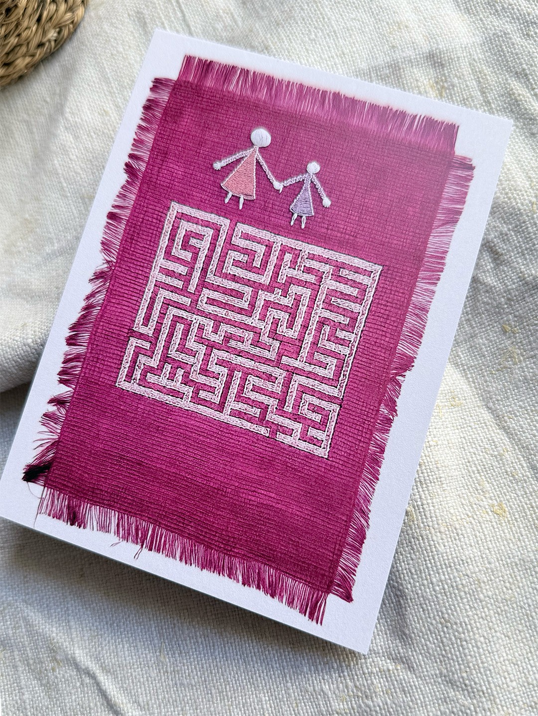 A Card with a embroidered Text