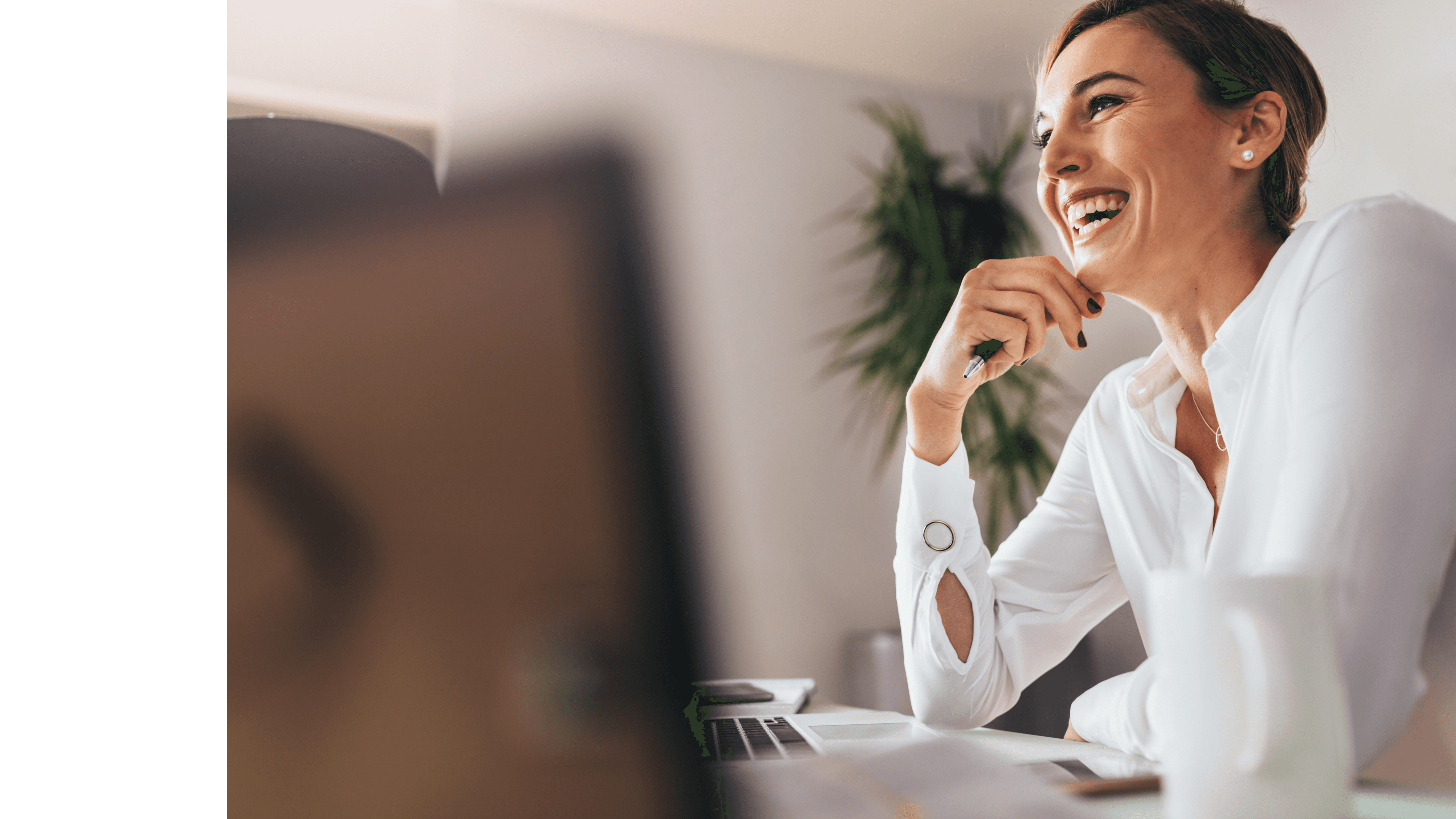 Focused woman looking away while working