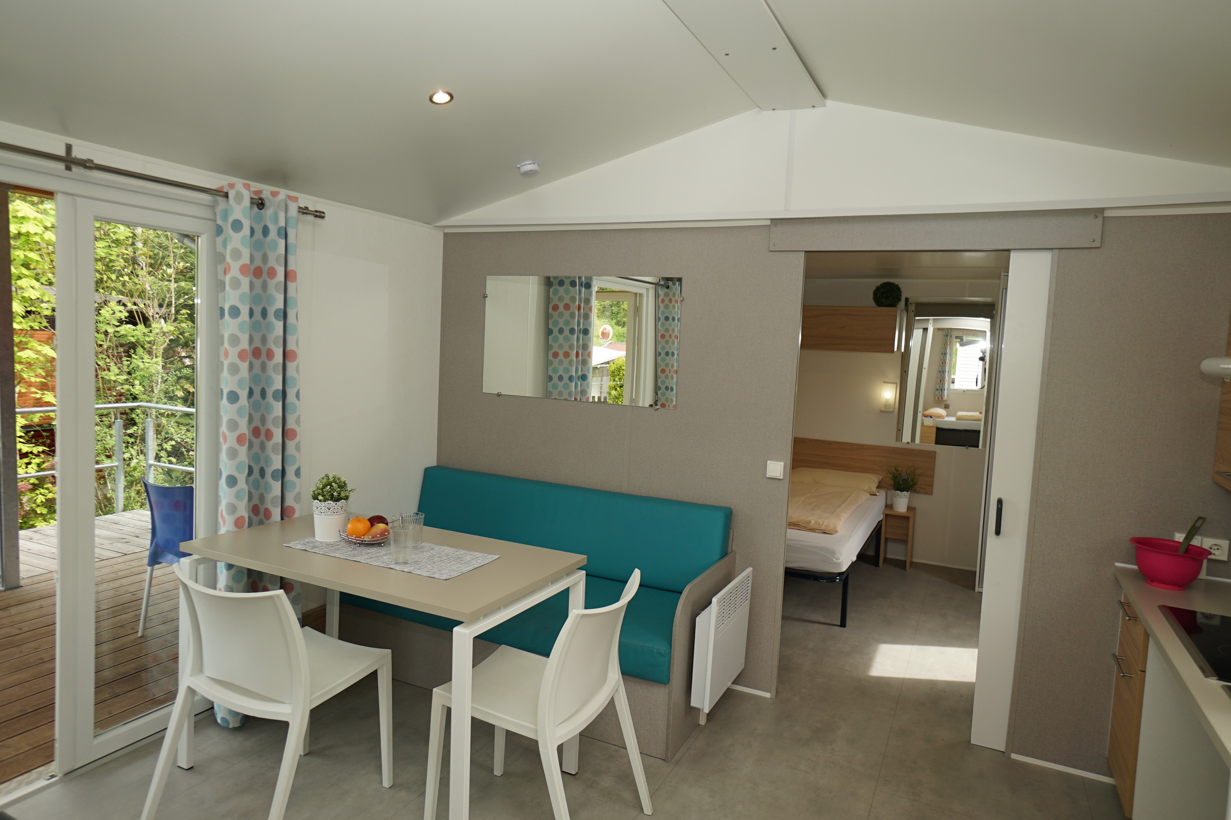 Living space of the barrier-free mobile home Life with table and chairs