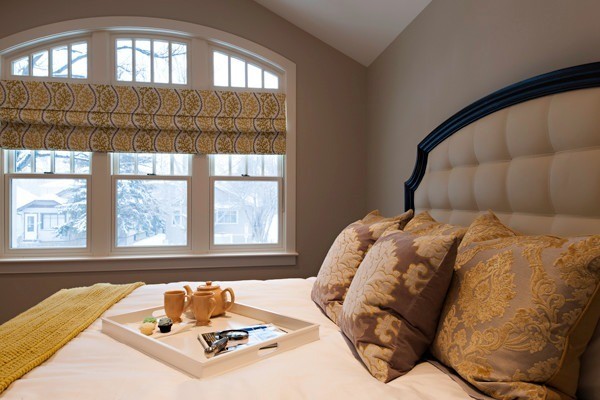 Image of Luxurious primary ensuites with elegant furniture, window coverings, and layout design by KHD Homes.