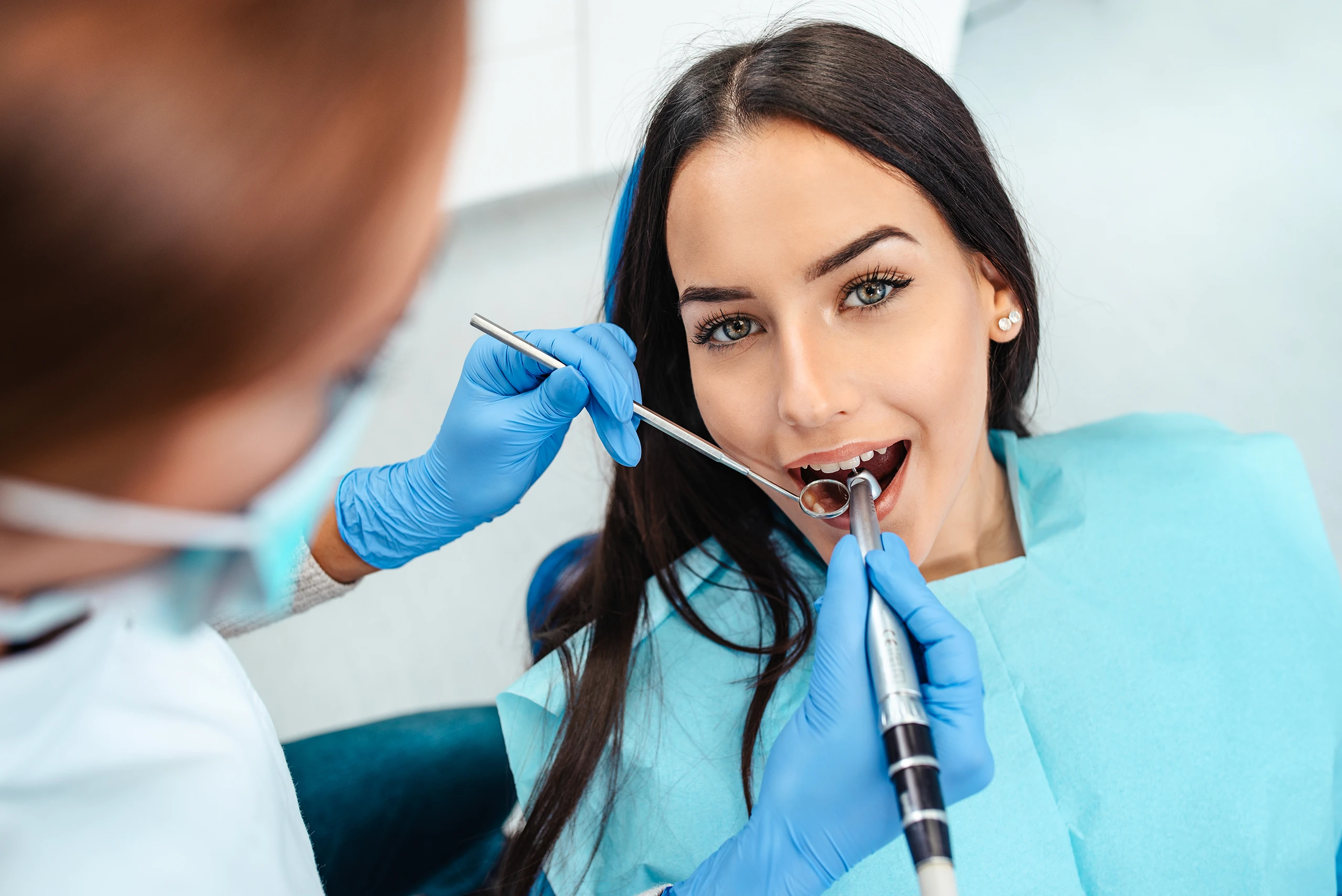 Patient showing a healthy smile during a dental check-up