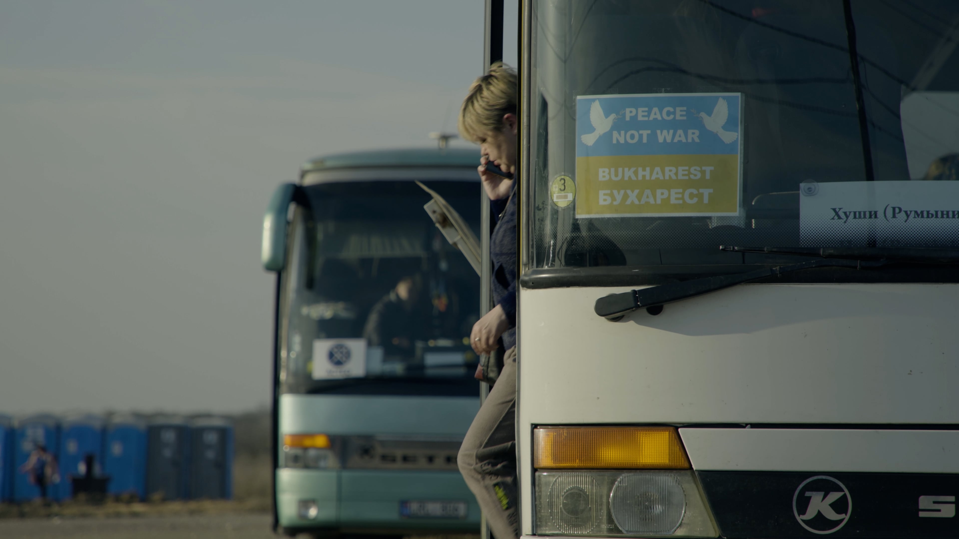 Girl walks out of a bus