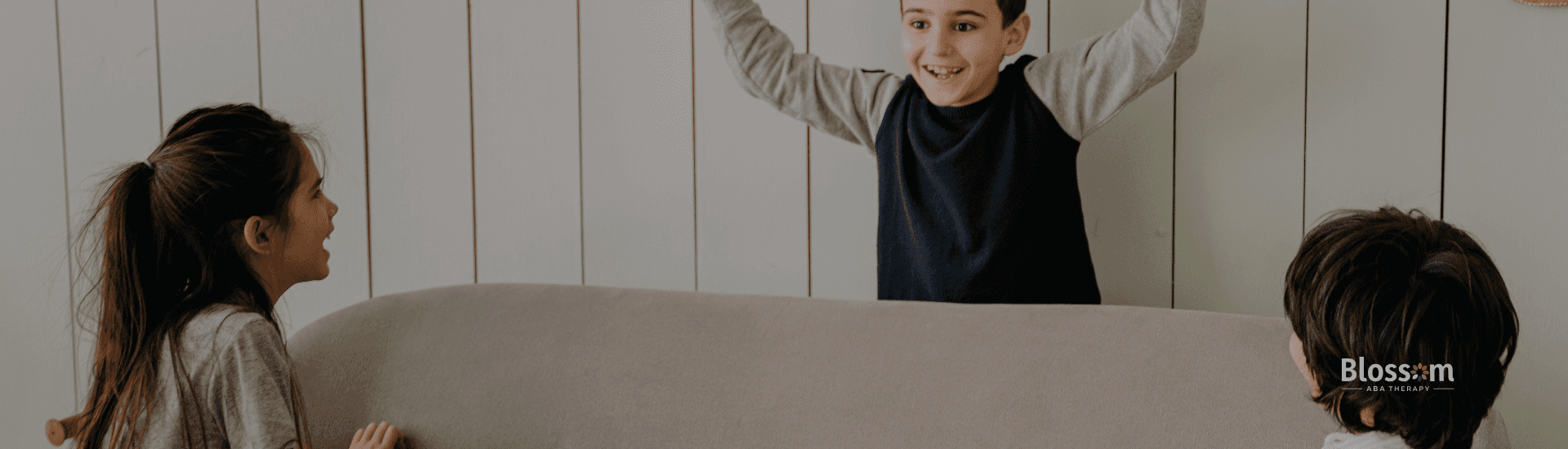Parents helping their child with ABA therapy