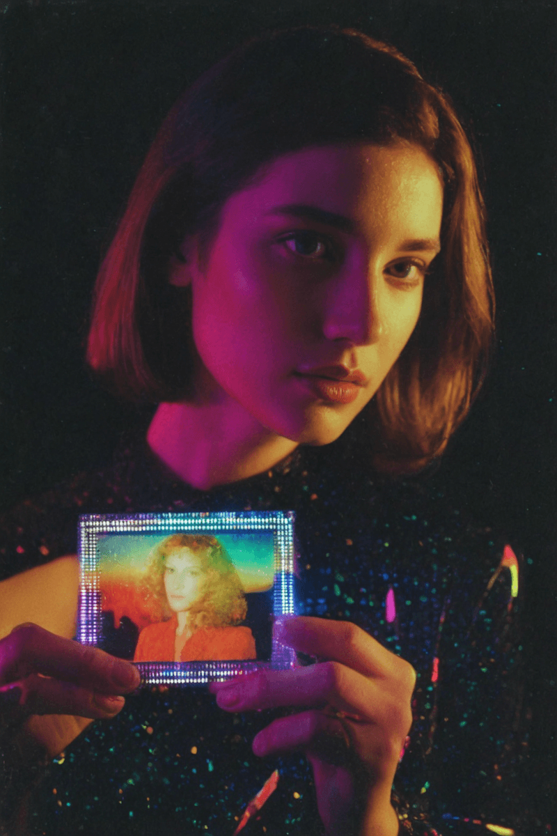 Man using resistance band for exercise, assisted by another person, improving flexibility.