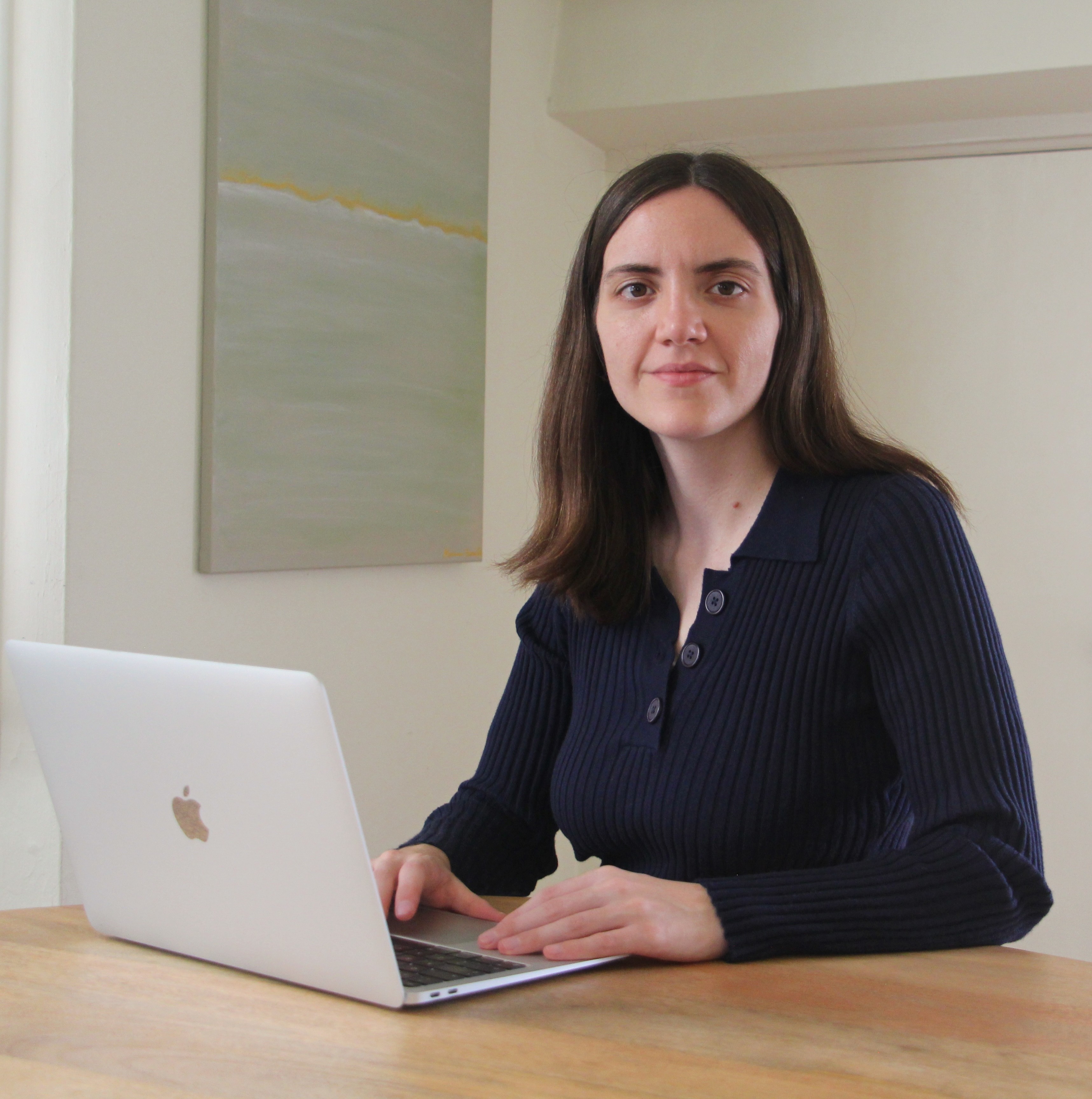 A photo of one of the co-founders of the studio looking at the camera.