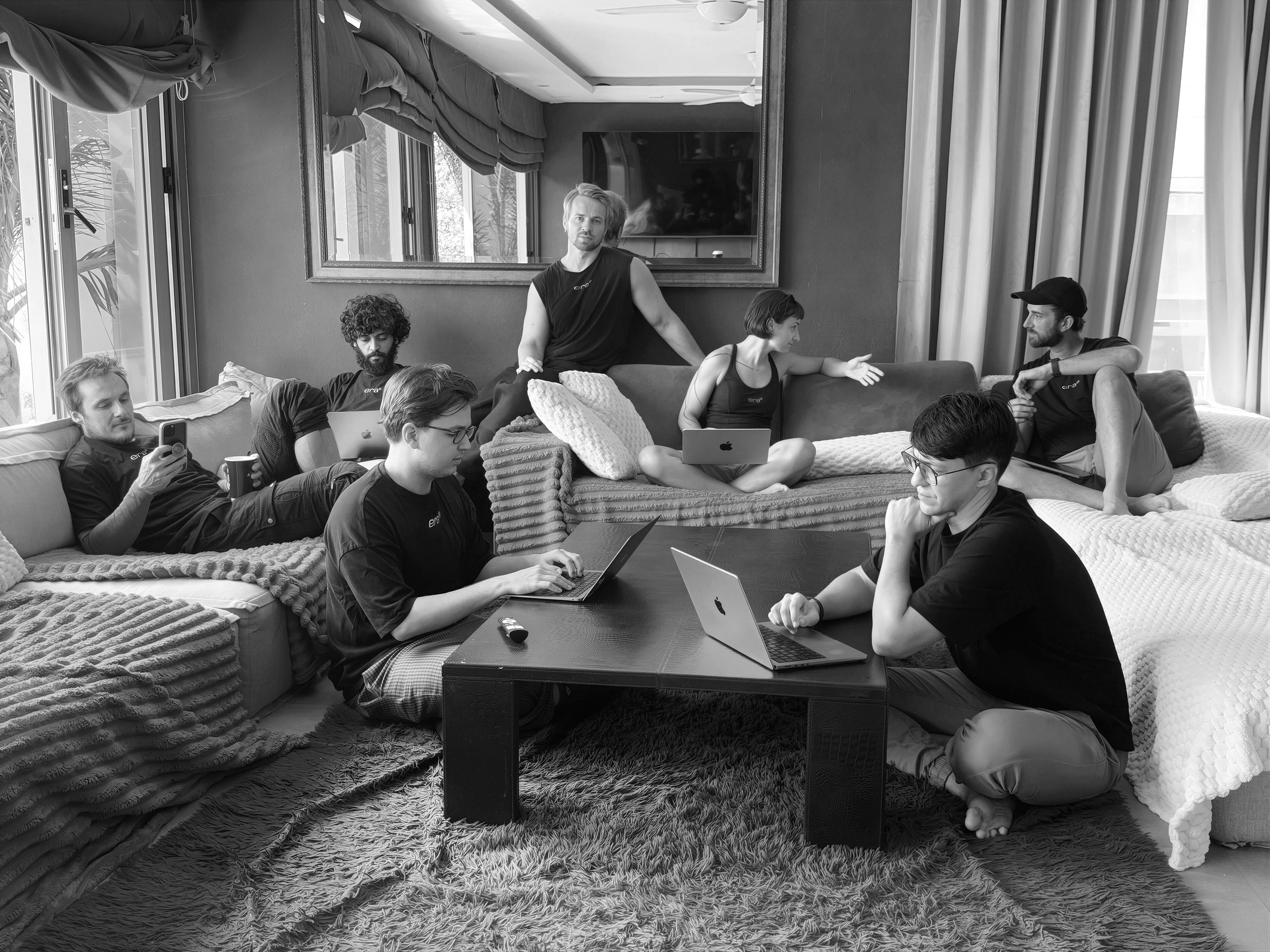 Abstract black ink splatter on white background.