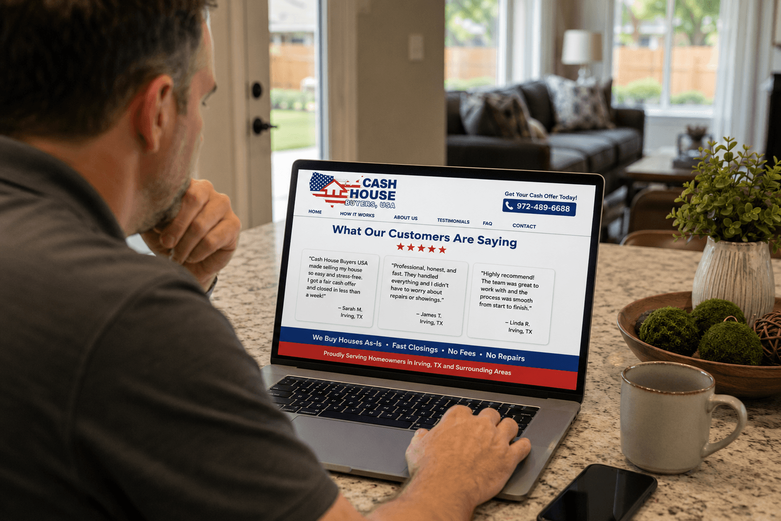 Man reading Cash House Buyers USA homeowner testimonials on laptop at kitchen counter in Irving, Texas home.