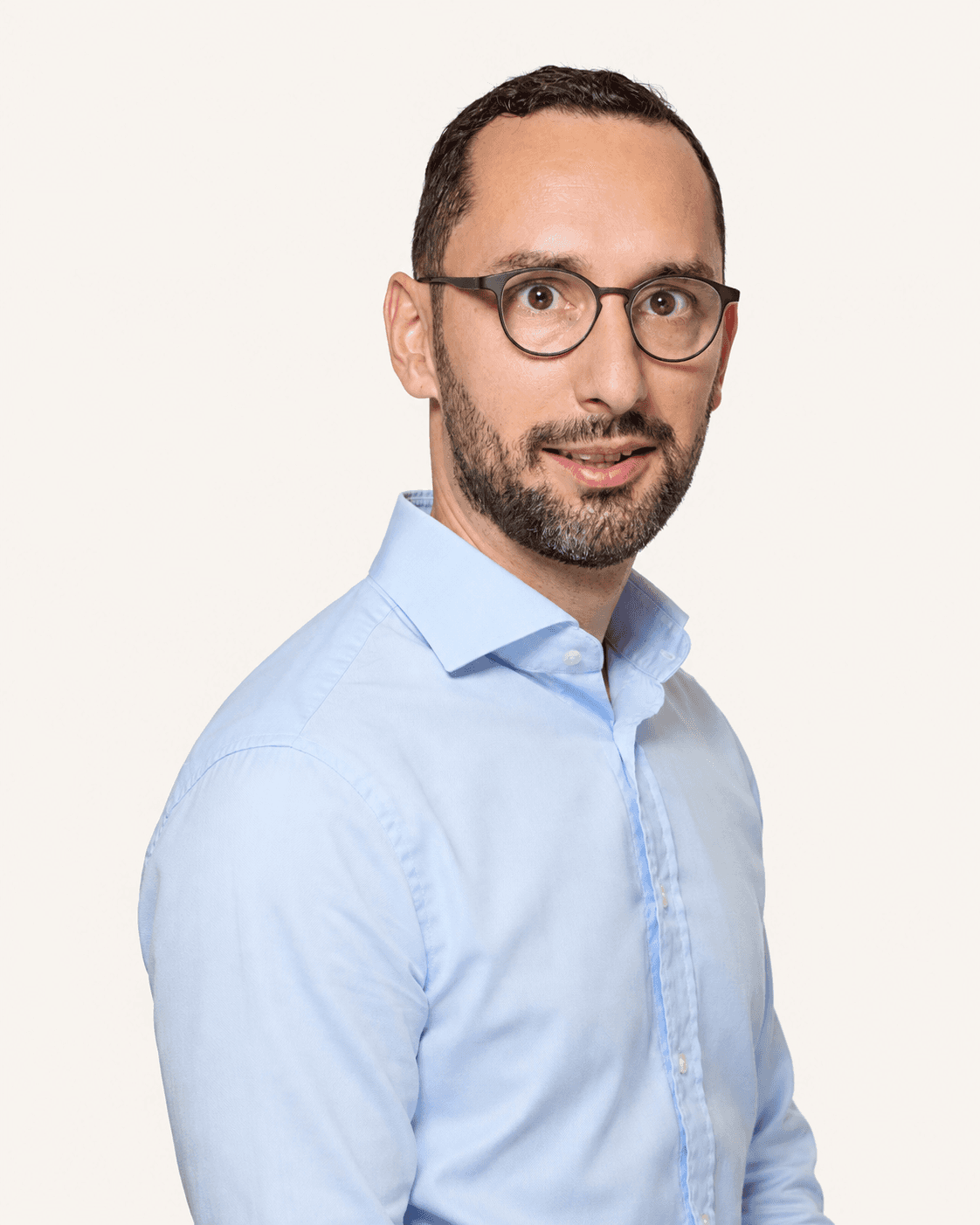 Peter Nestorov in a light-blue shirt