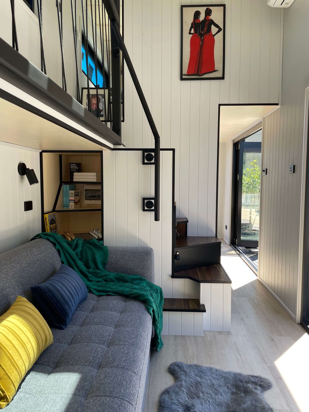 Petite Maison Black Edition Living Room With Space-Saving Stairs