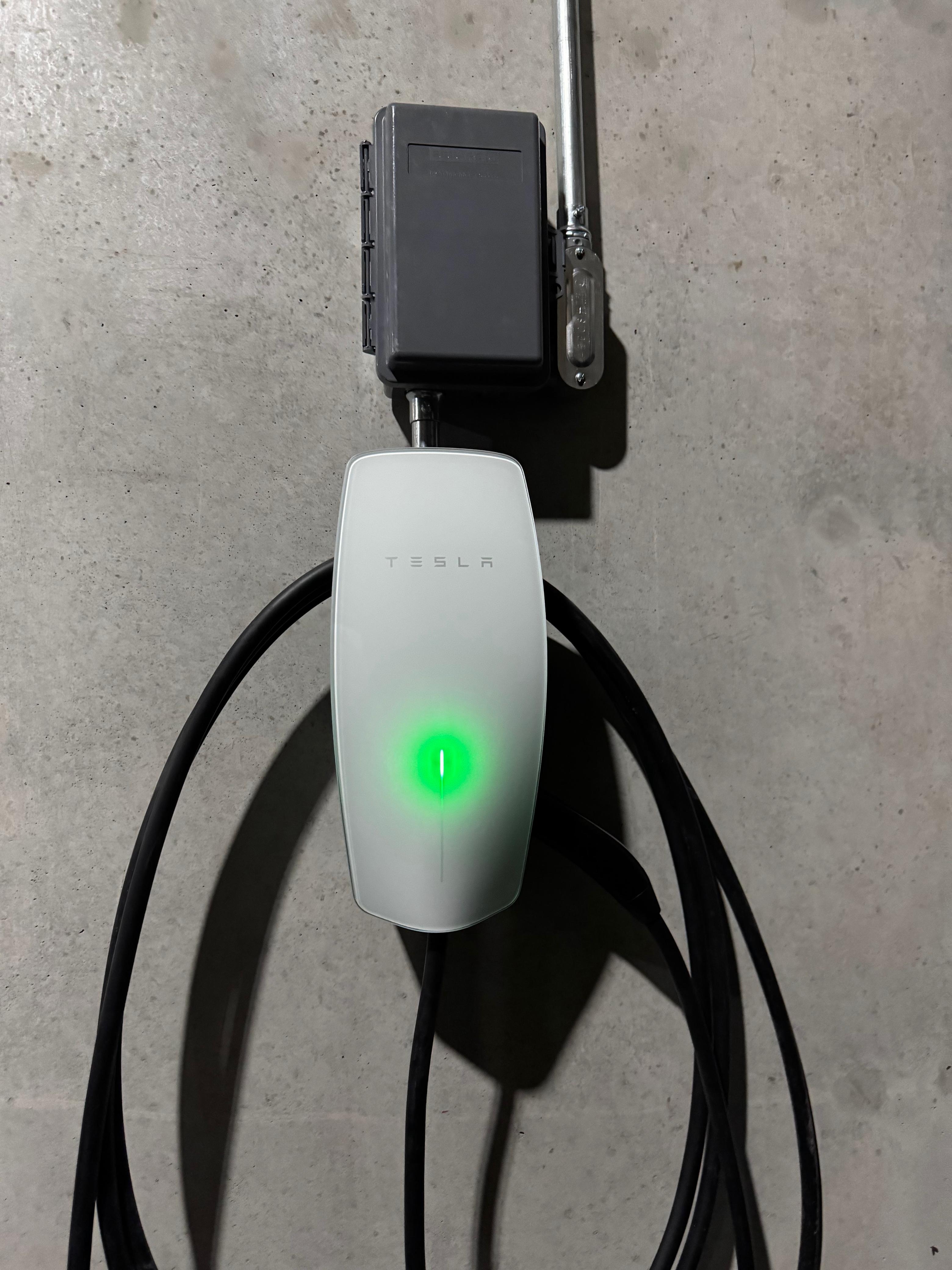 husband and wife working happily on a laptop