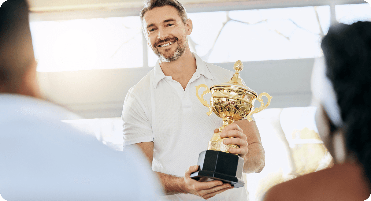 a happy man receiving award