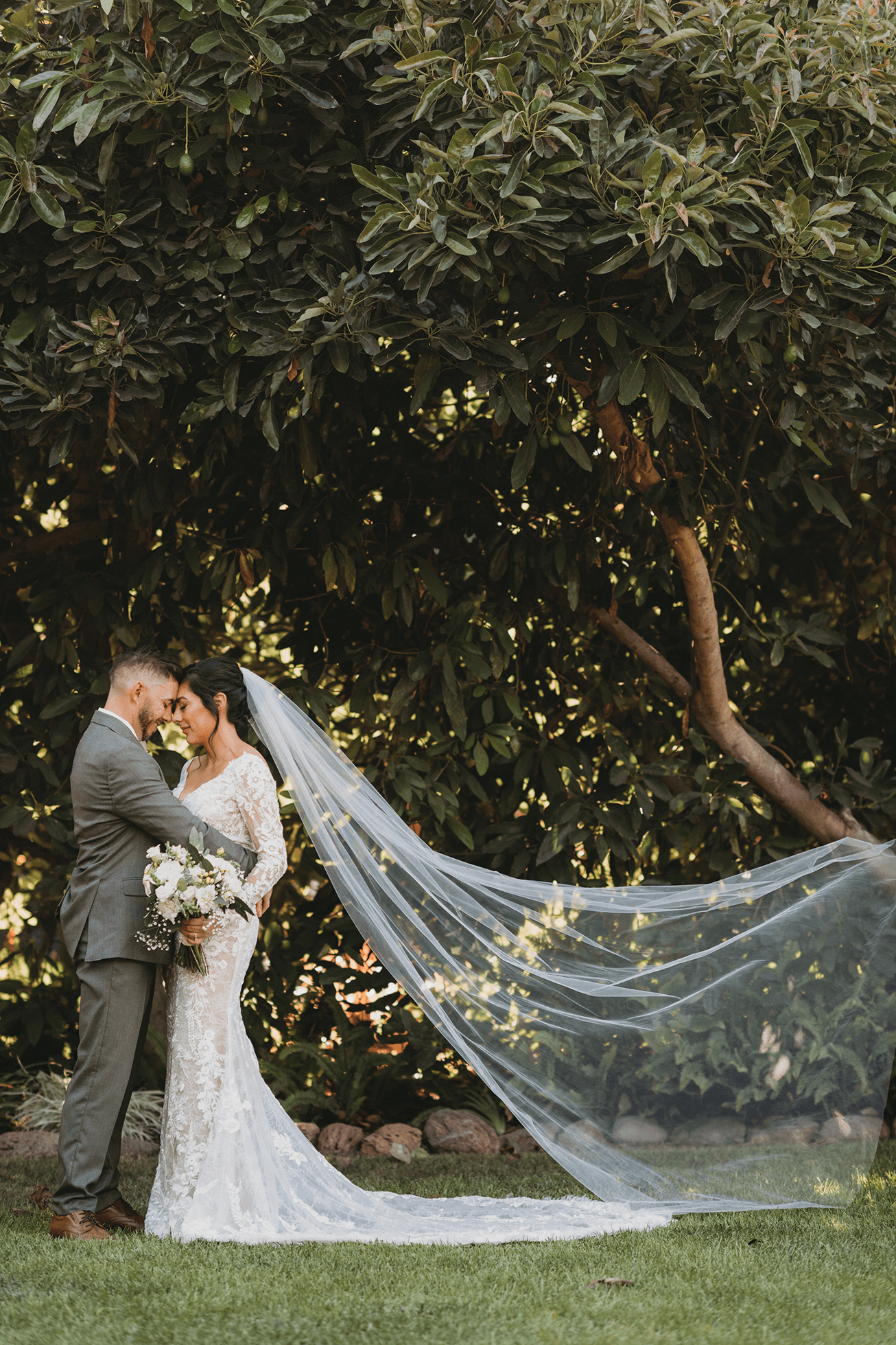 Flat lay wedding details with bouquet, rings, and sparkling bridal heels