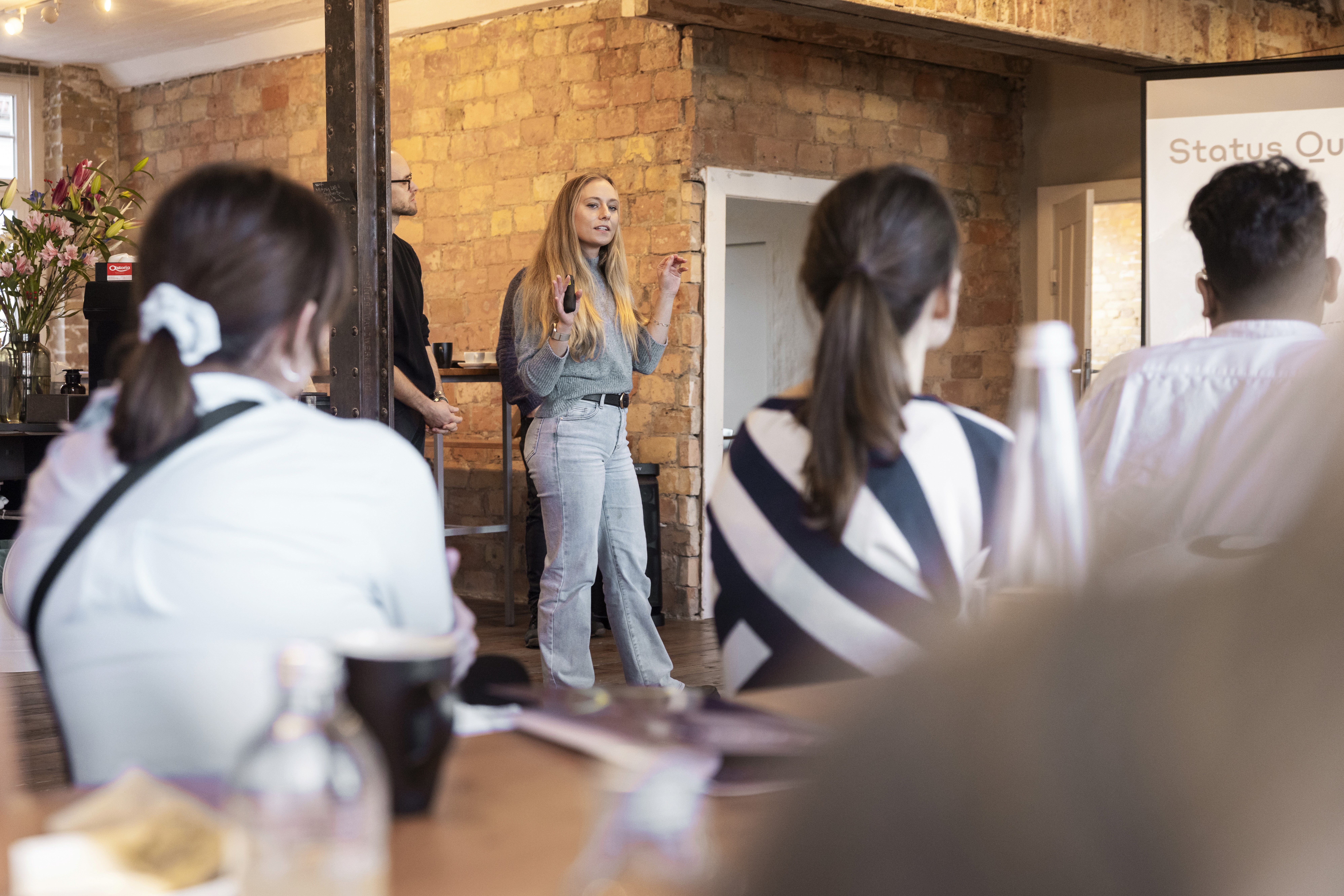 man in blue dress shirt and woman in black long sleeve shirt