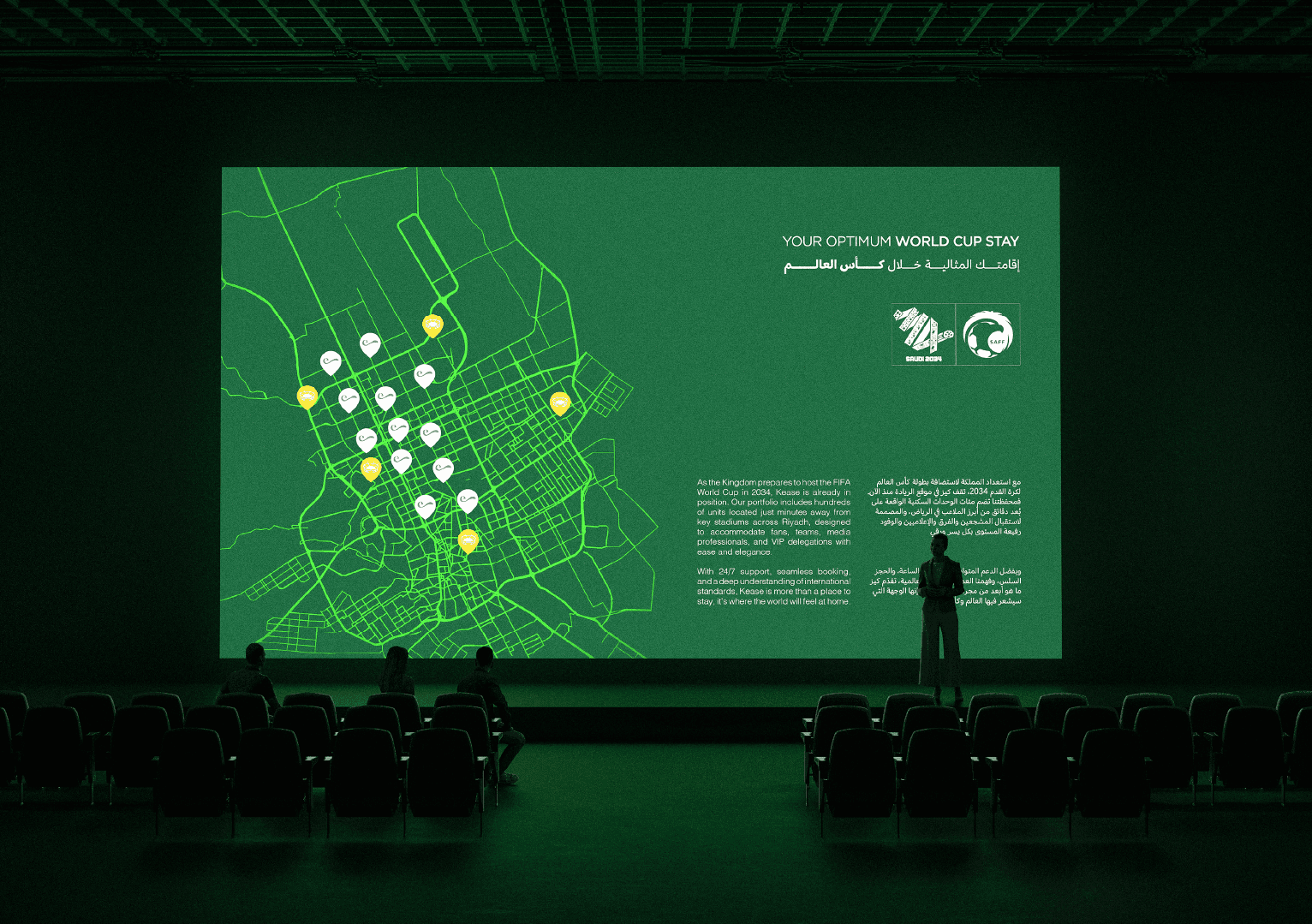 Man presents to colleagues in a modern office meeting.