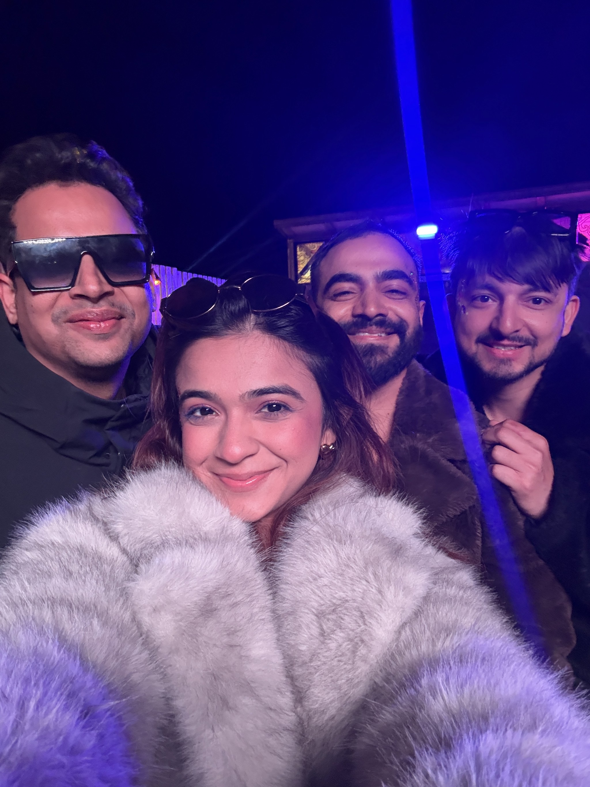 woman in blue hijab sitting on chair