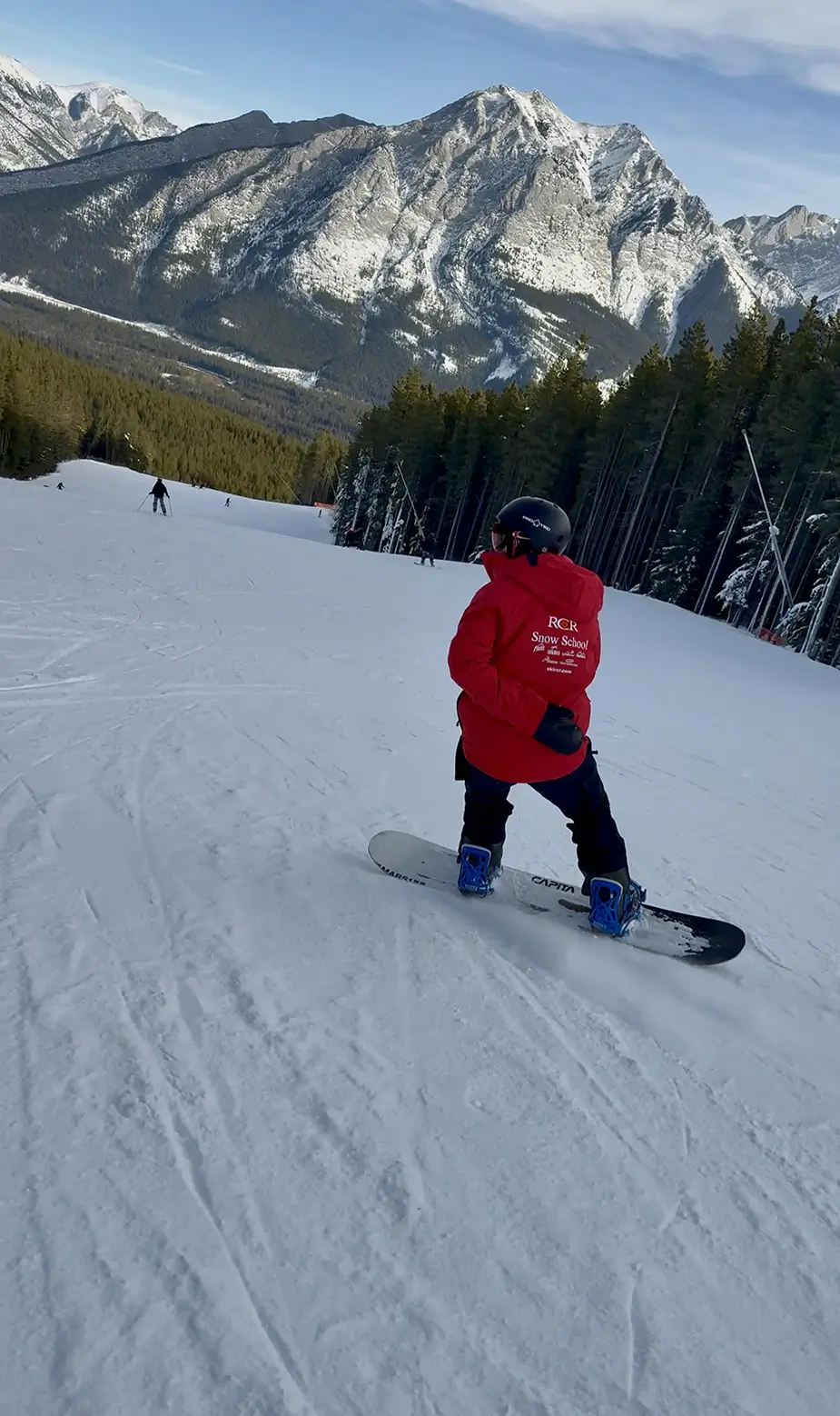 Me teaching snowboarding
