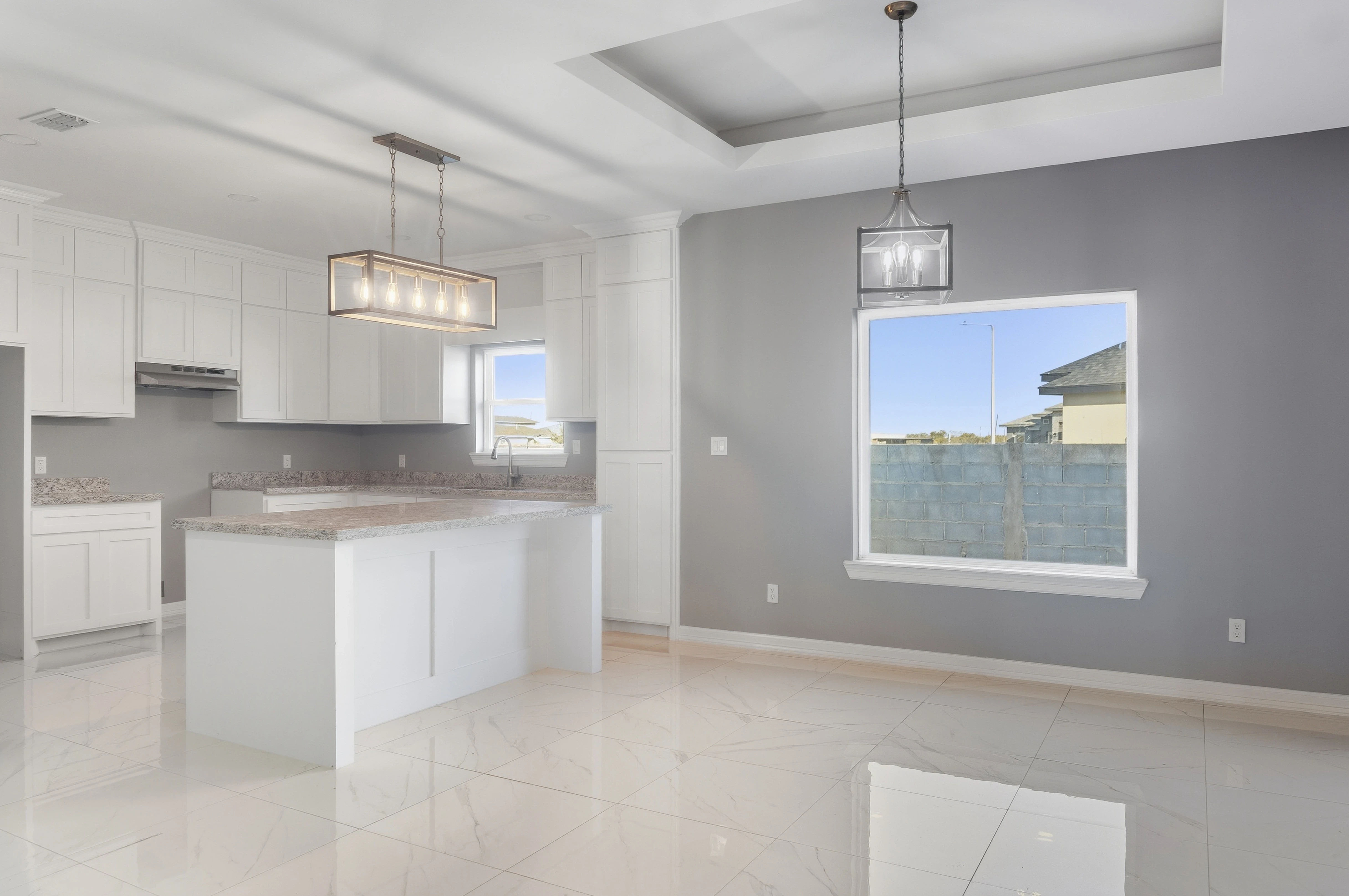 A picture of a house during twilight.