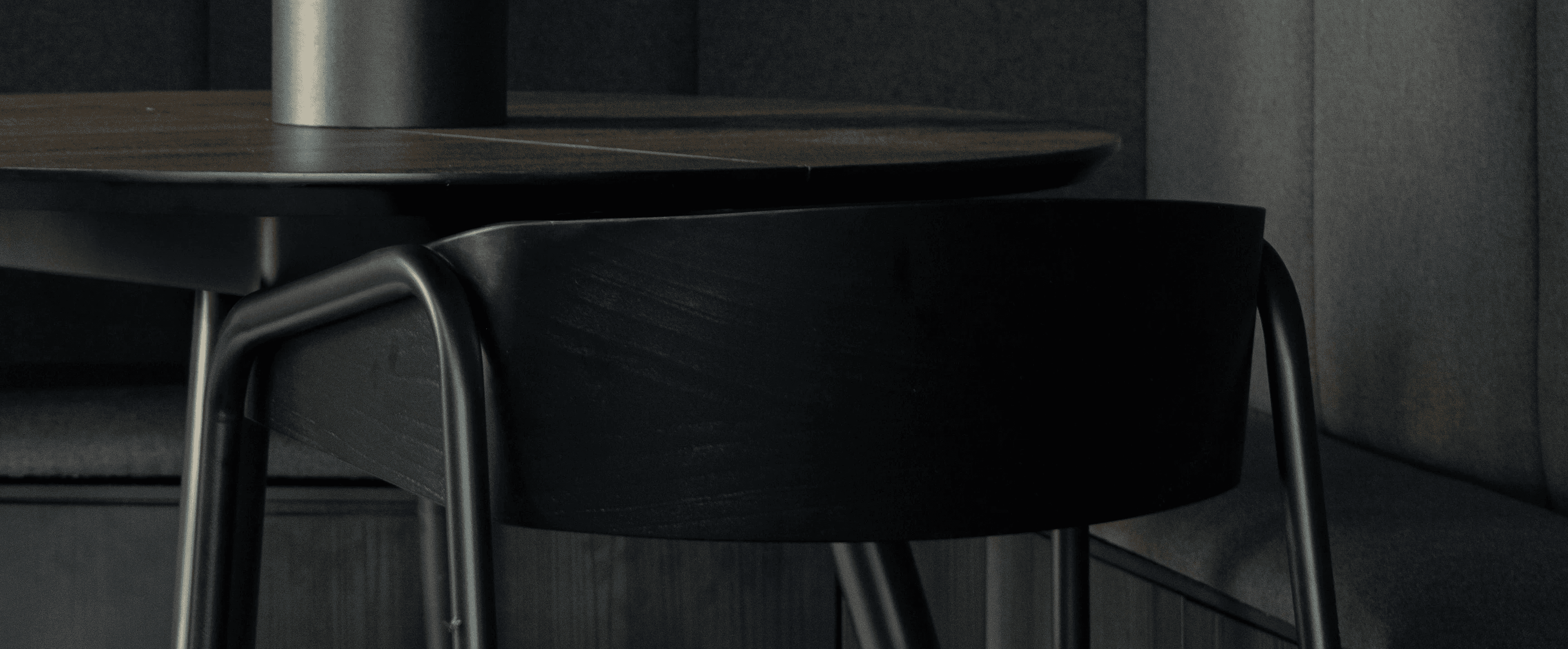 a table with a vase of flowers on top of it