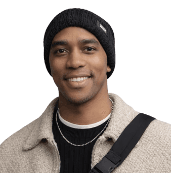man standing in front of window