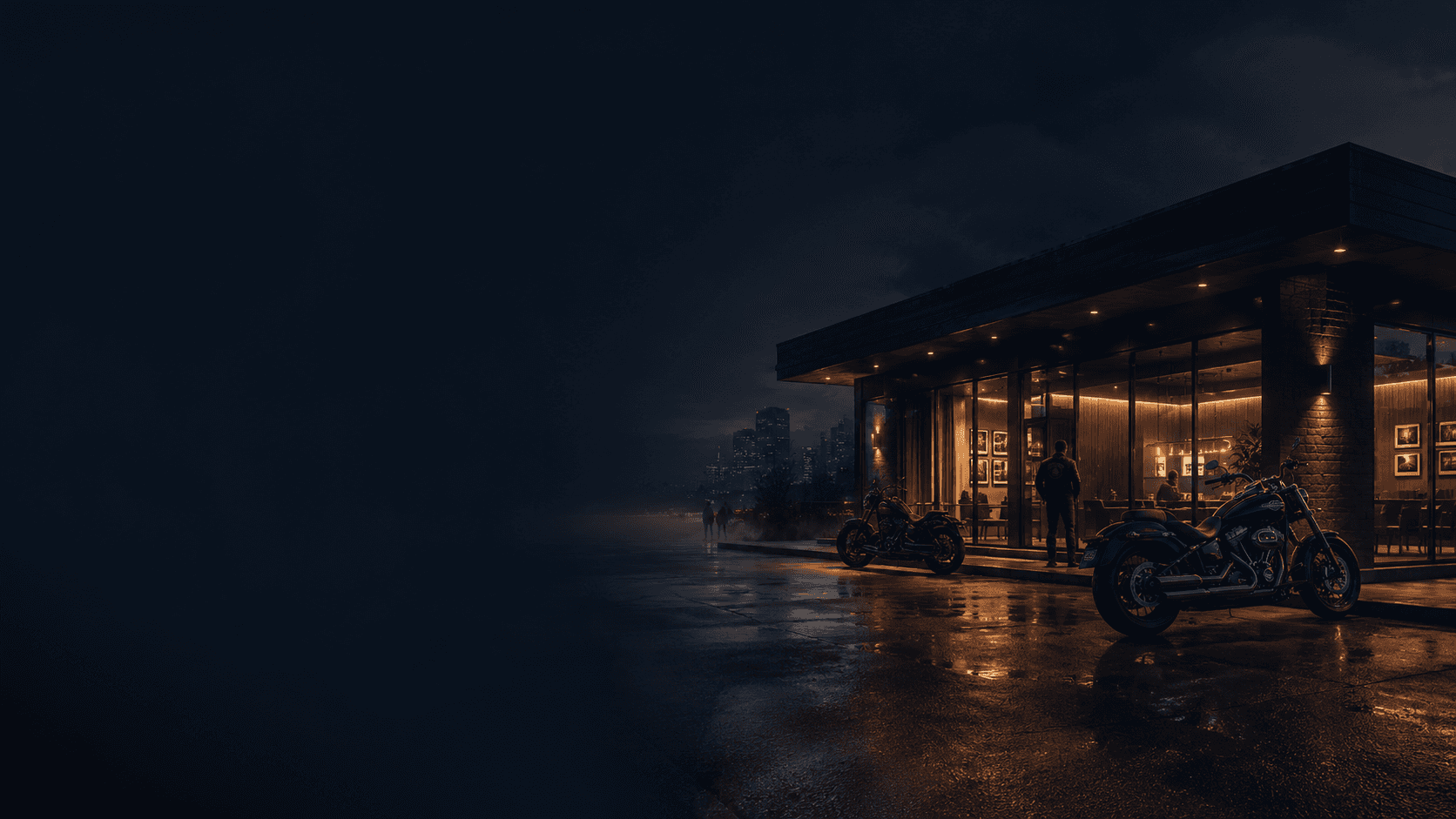 Modern white building on a cliff overlooking dark stormy seas.