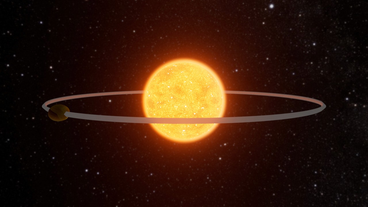 a cellphone leaning against a wall