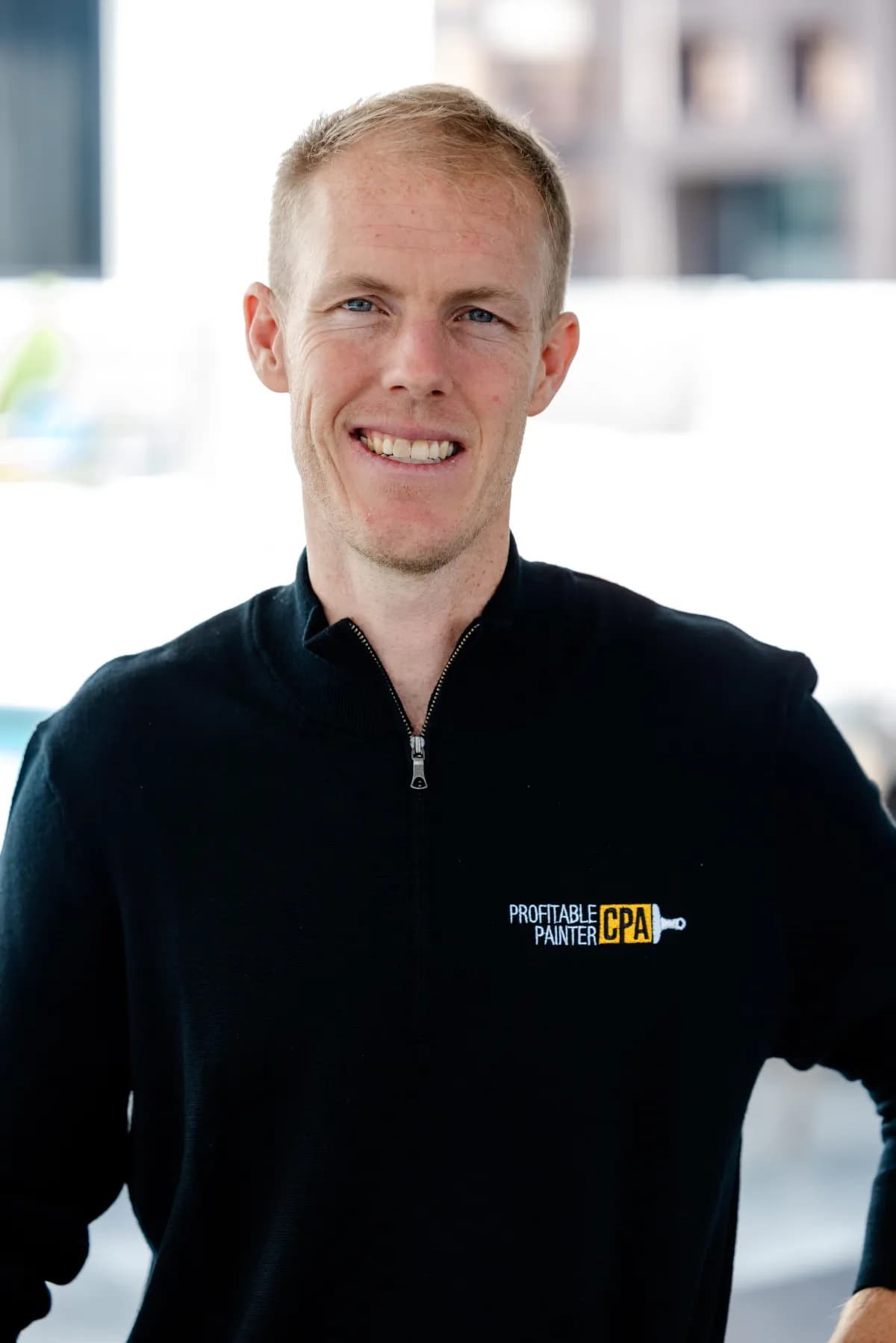 Daniel Honan picture standing smiling.