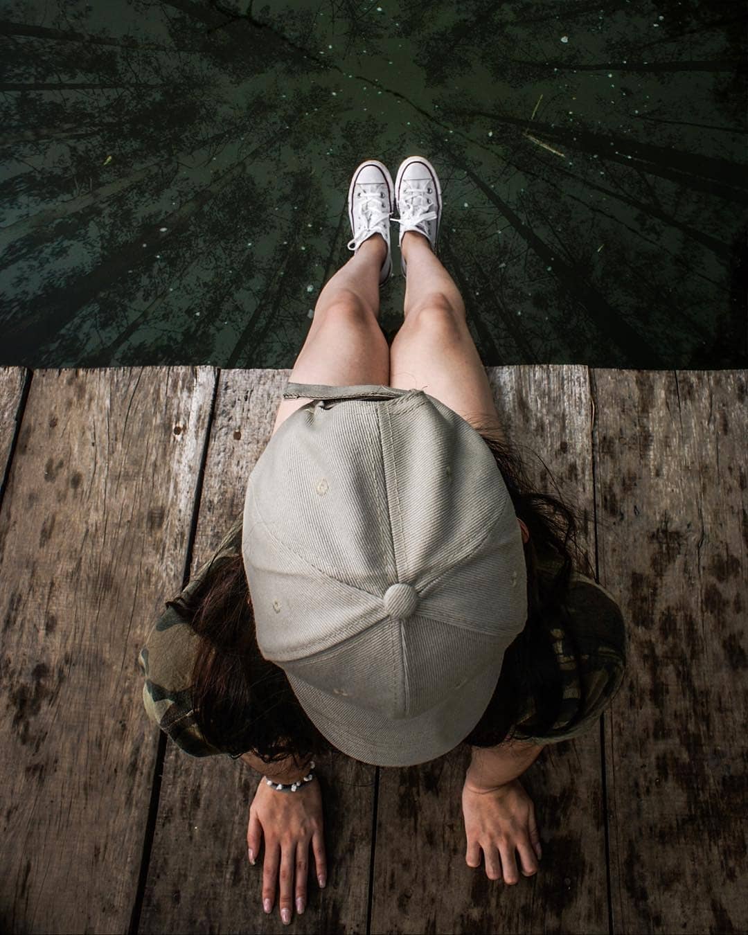 a woman holding an apple
