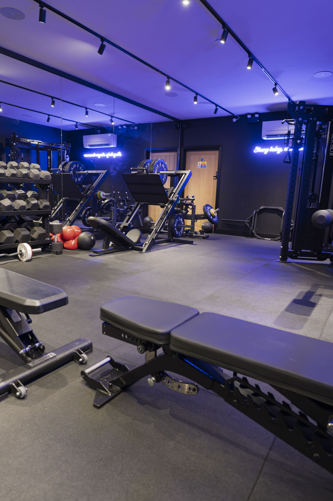 A small house with a grass roof in misty landscape.