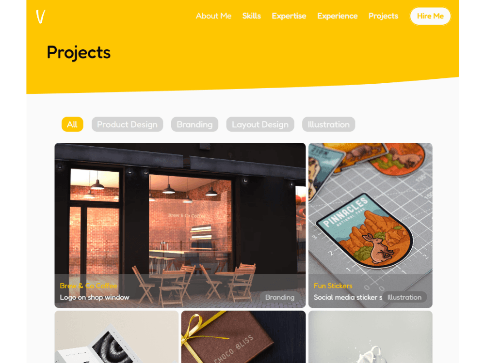 A MacBook with lines of code on its screen on a busy desk