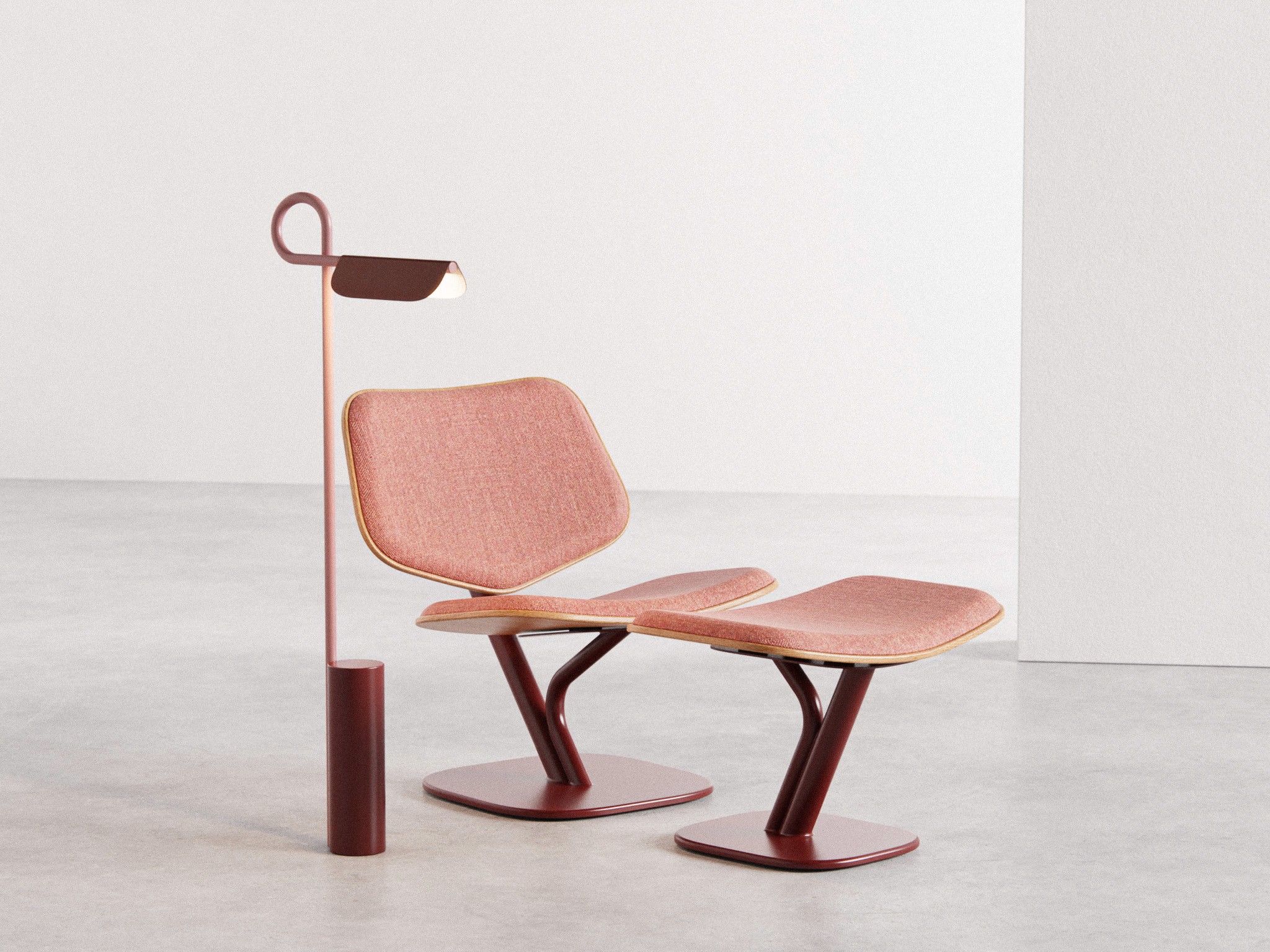 Loops Floor Lamp alongside the Till Lounge Chair and ottoman in red, noknok Studio soft steel collection