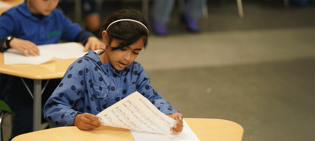 Students developing vocal technique and stage confidence in a HOKALI vocal training enrichment program