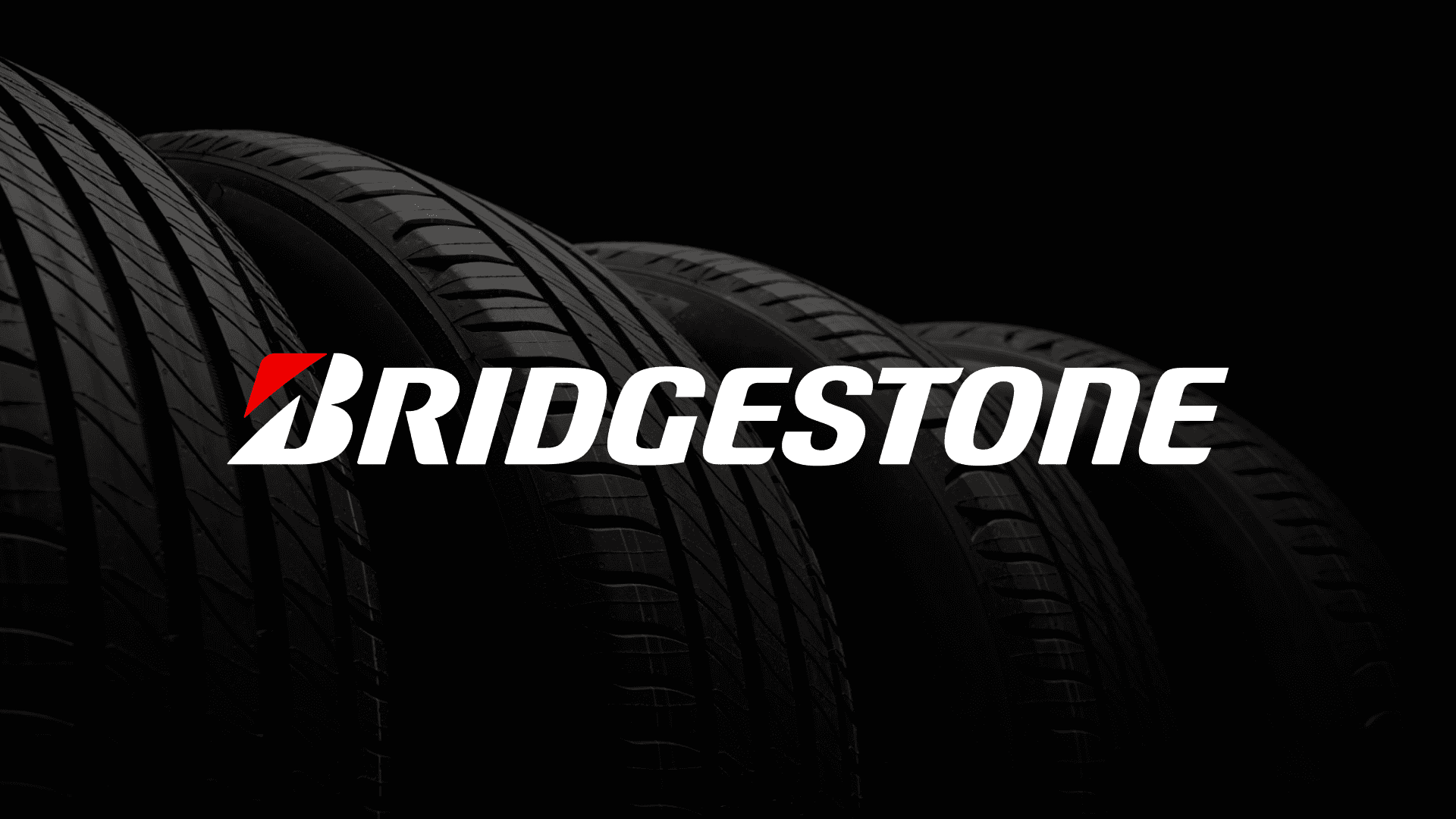 An image of the Bridgestone logo overlaid on an image of 4 tyres with a black background