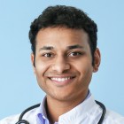 Smiling male physician headshot representing board-certified radiology locums professionals.