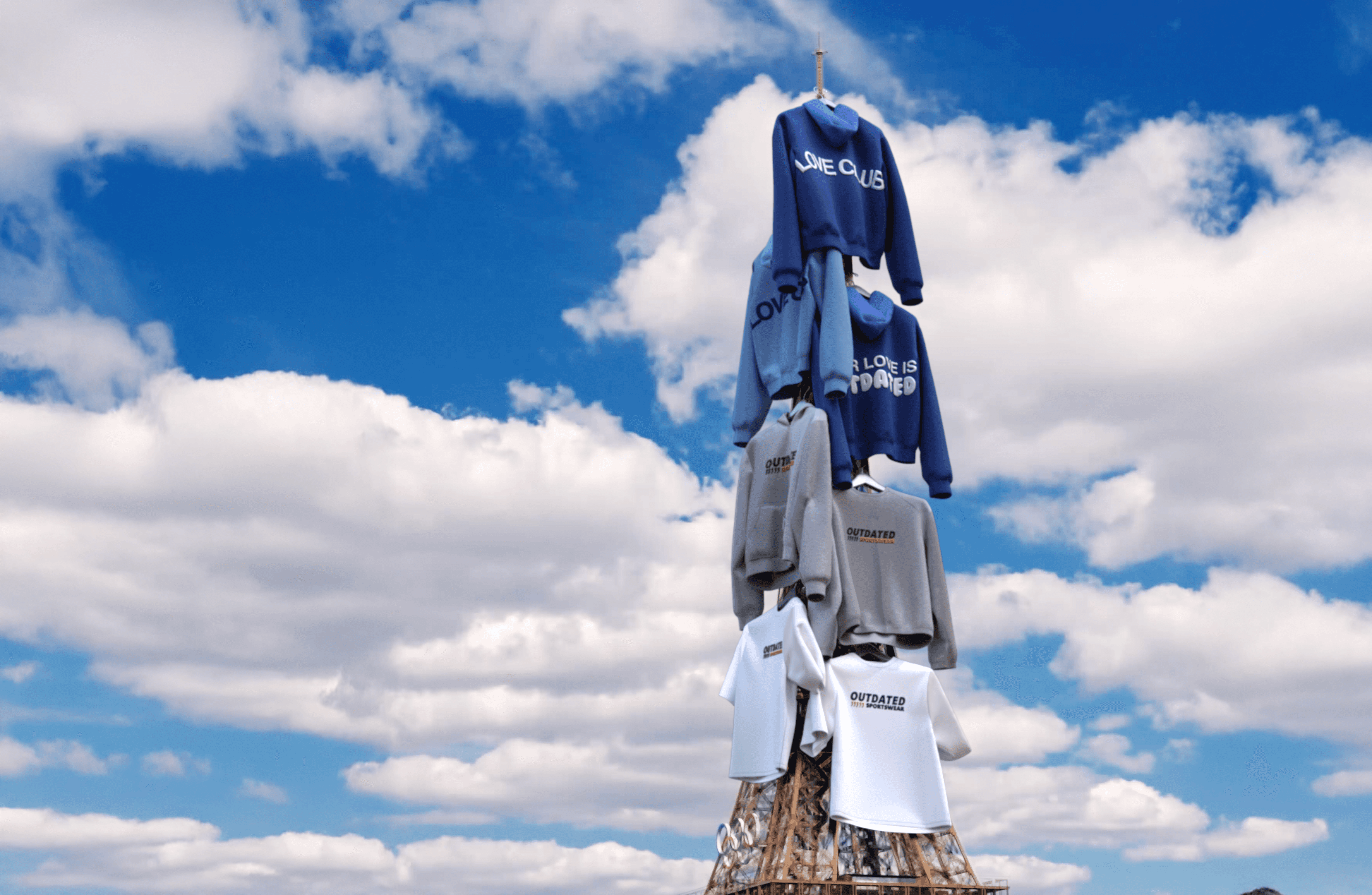 Large Outdated hoodies hanging on the Eiffel Tower