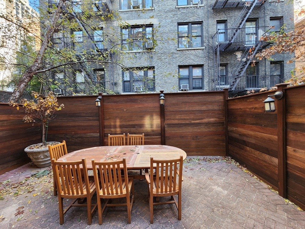 Ipe hardwood fence (Brazilian walnut) installation in Upper West Side Manhattan by Jewel Construction